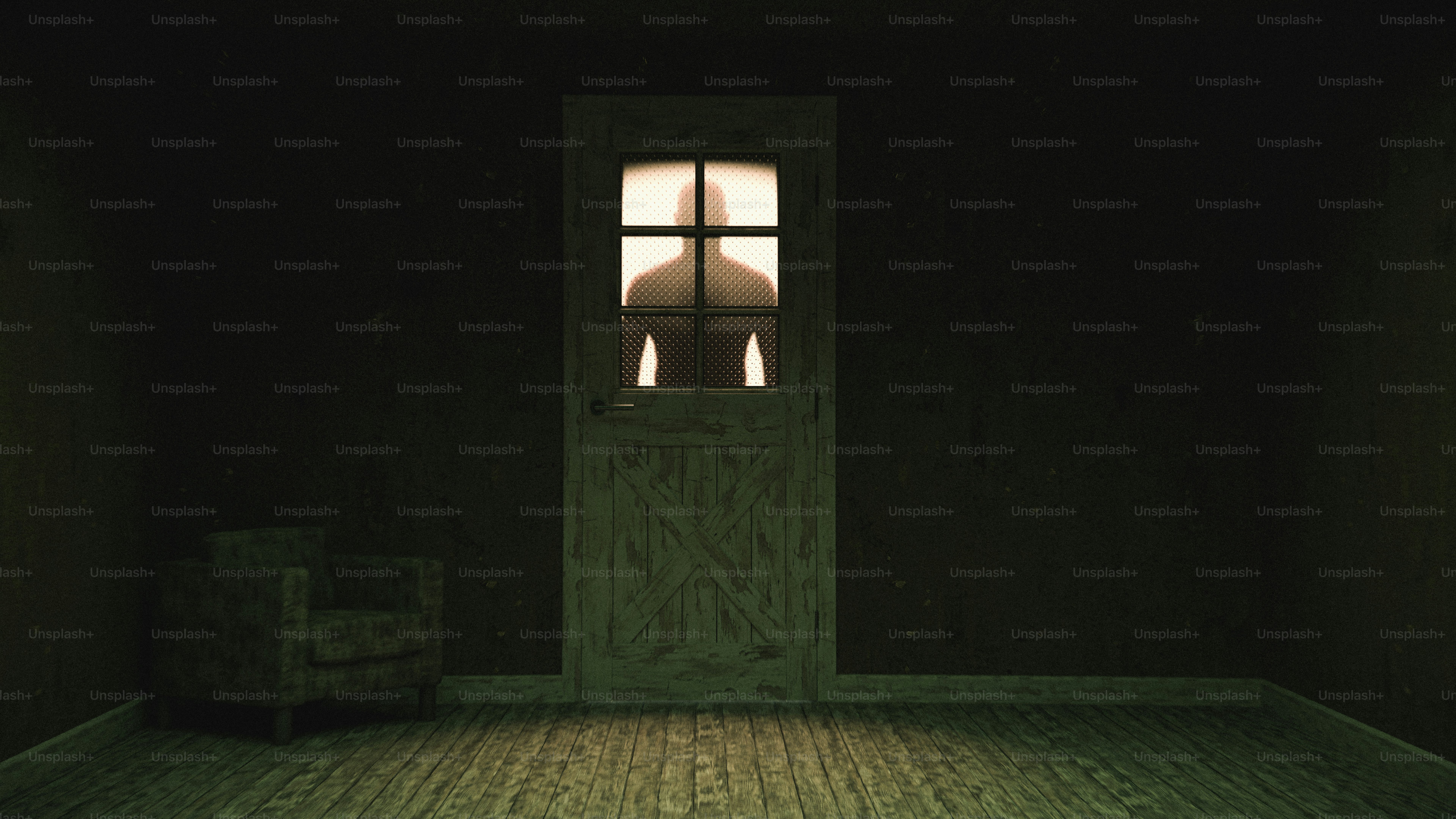 A silhouette of a person behind a glass paneled door in a dark room