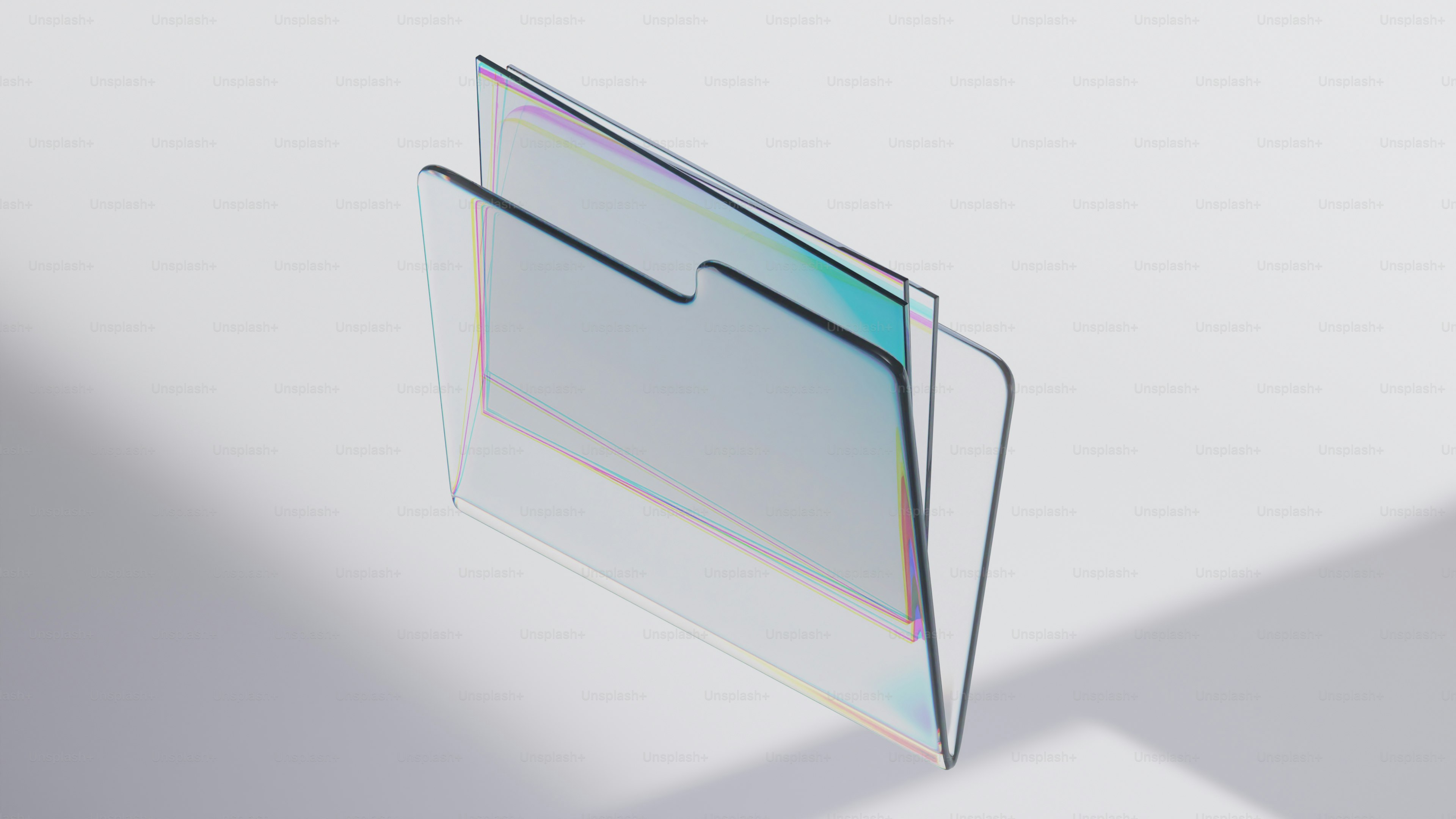 A translucent folder with layered panels and iridescent edges floating above a pale surface