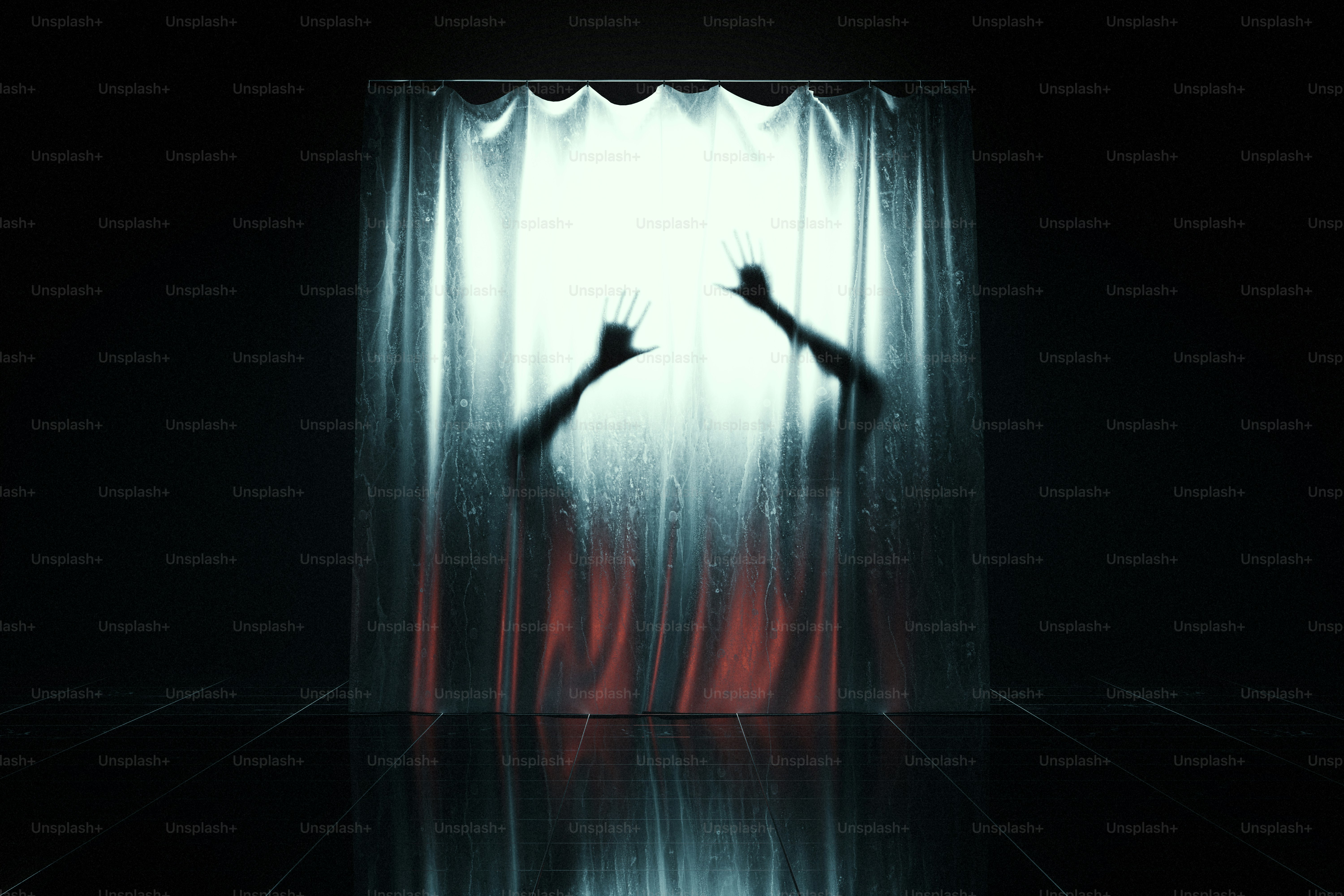 Silhouettes of two hands pressed against a translucent curtain backlit by bright light