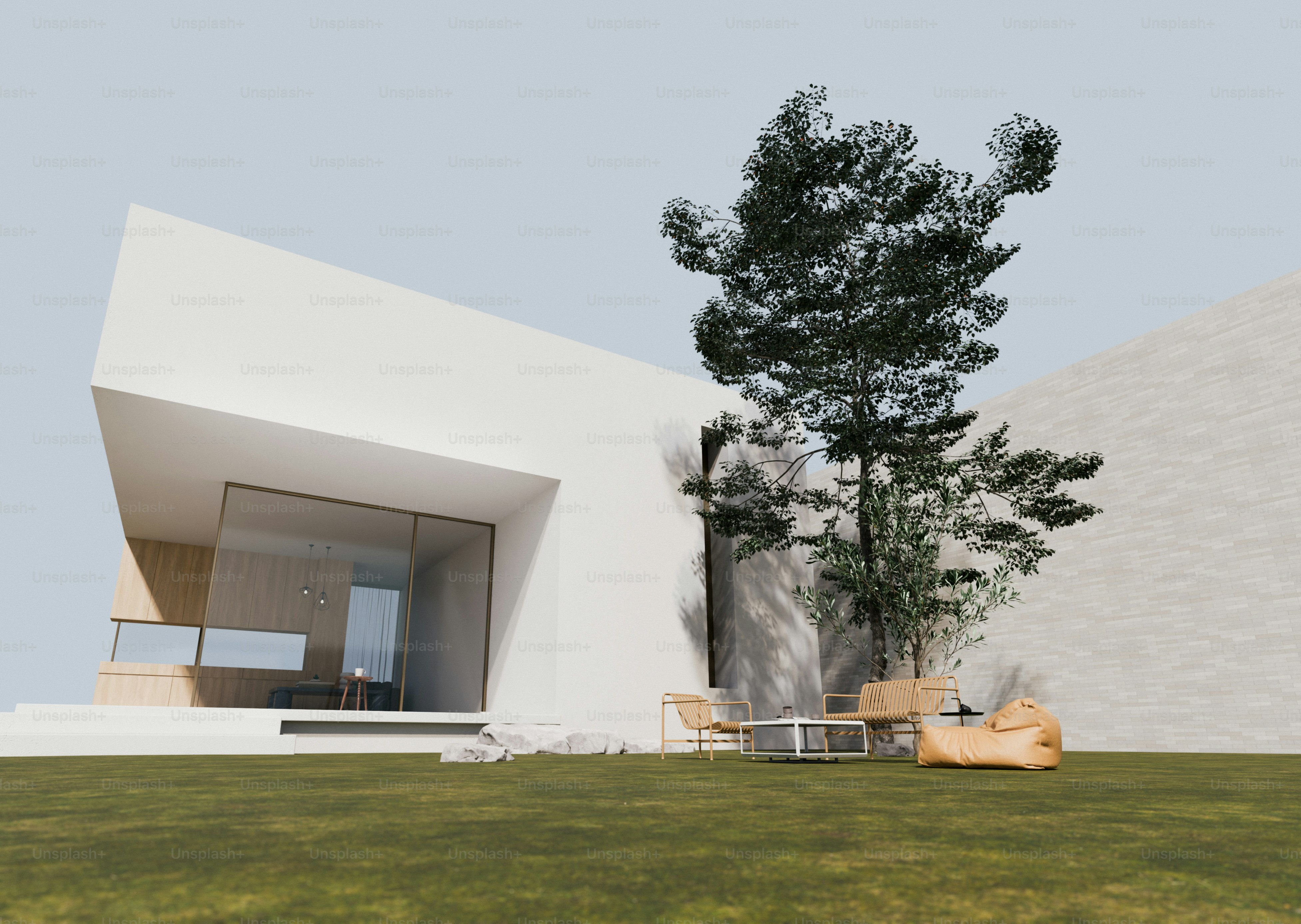 Modern white house with patio furniture - Photo on Unsplash+