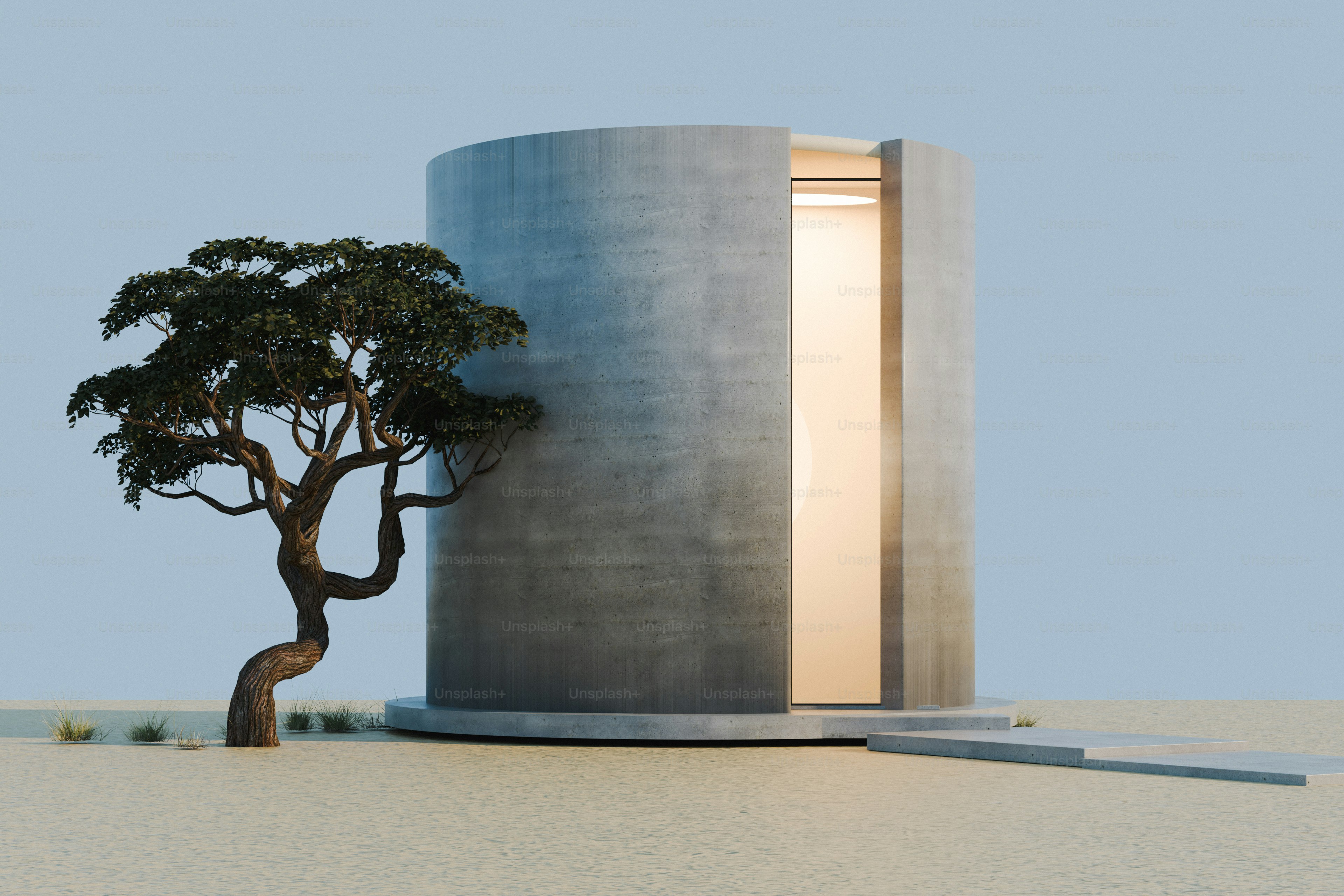 Una estructura cilíndrica de hormigón con una puerta luminosa junto a un pequeño árbol