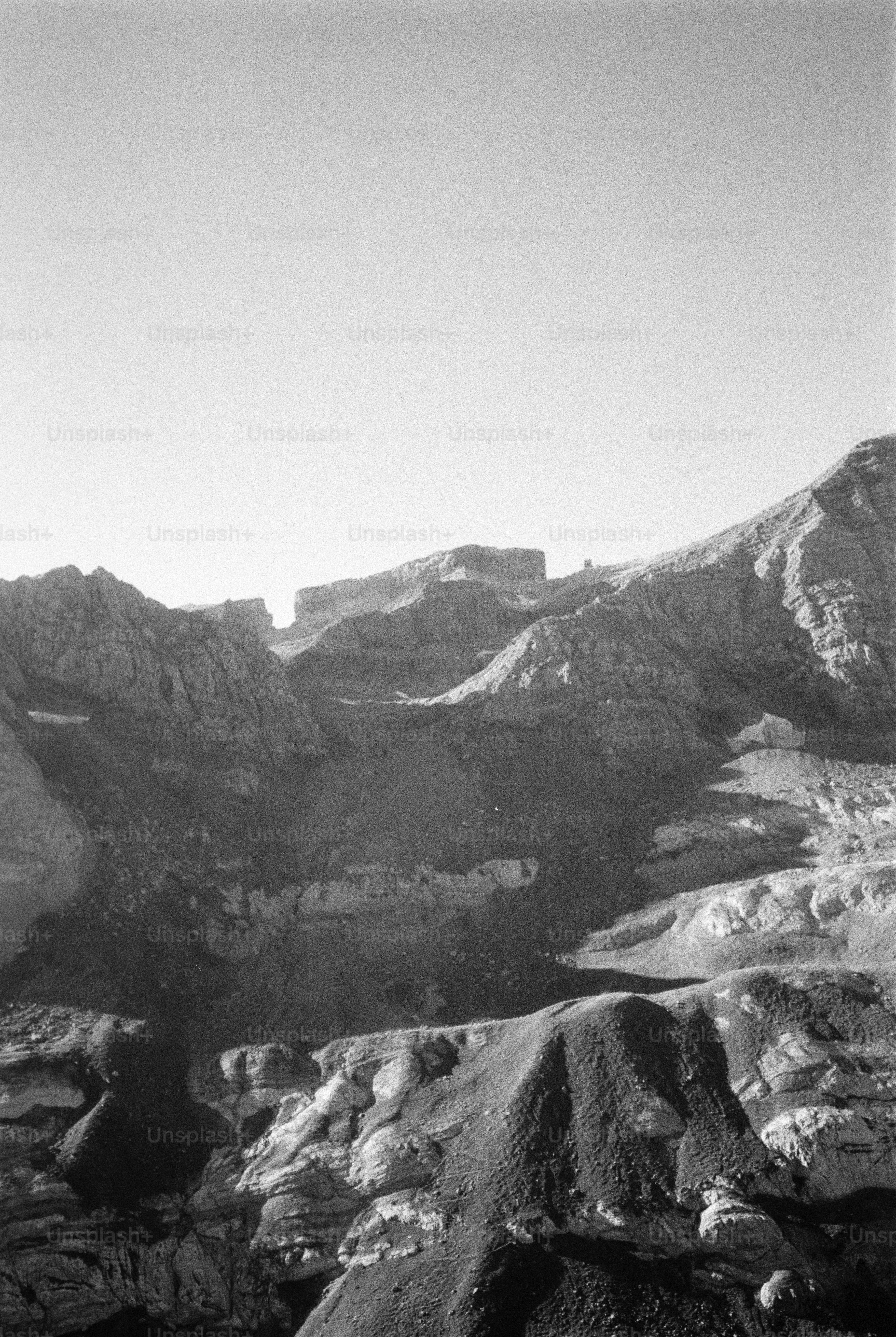 Rugged mountain slope in black and white - Photo on Unsplash+