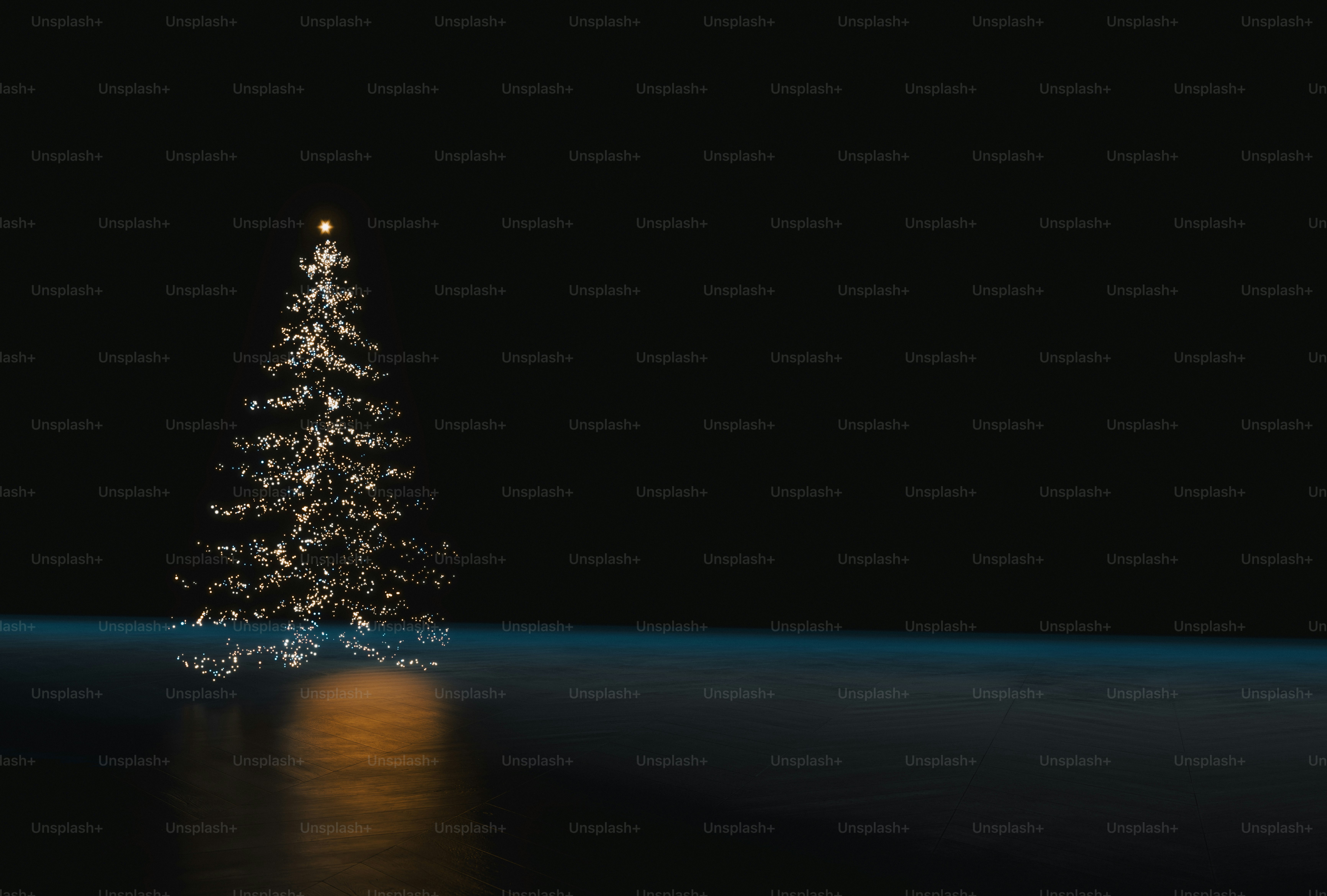 A glowing Christmas tree silhouette against a dark background with a warm light reflection