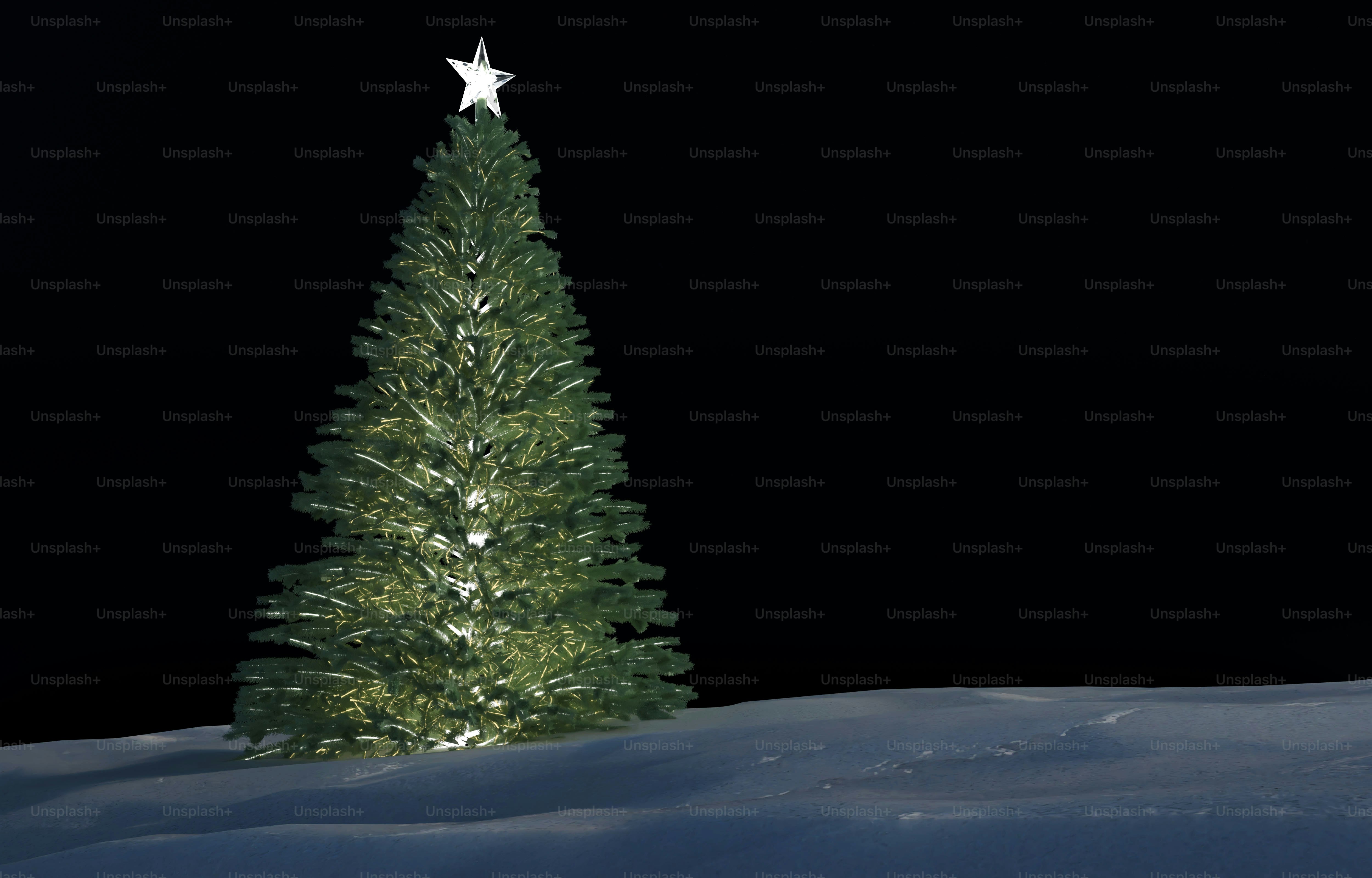 A glowing green Christmas tree with a star topper on a snowy surface