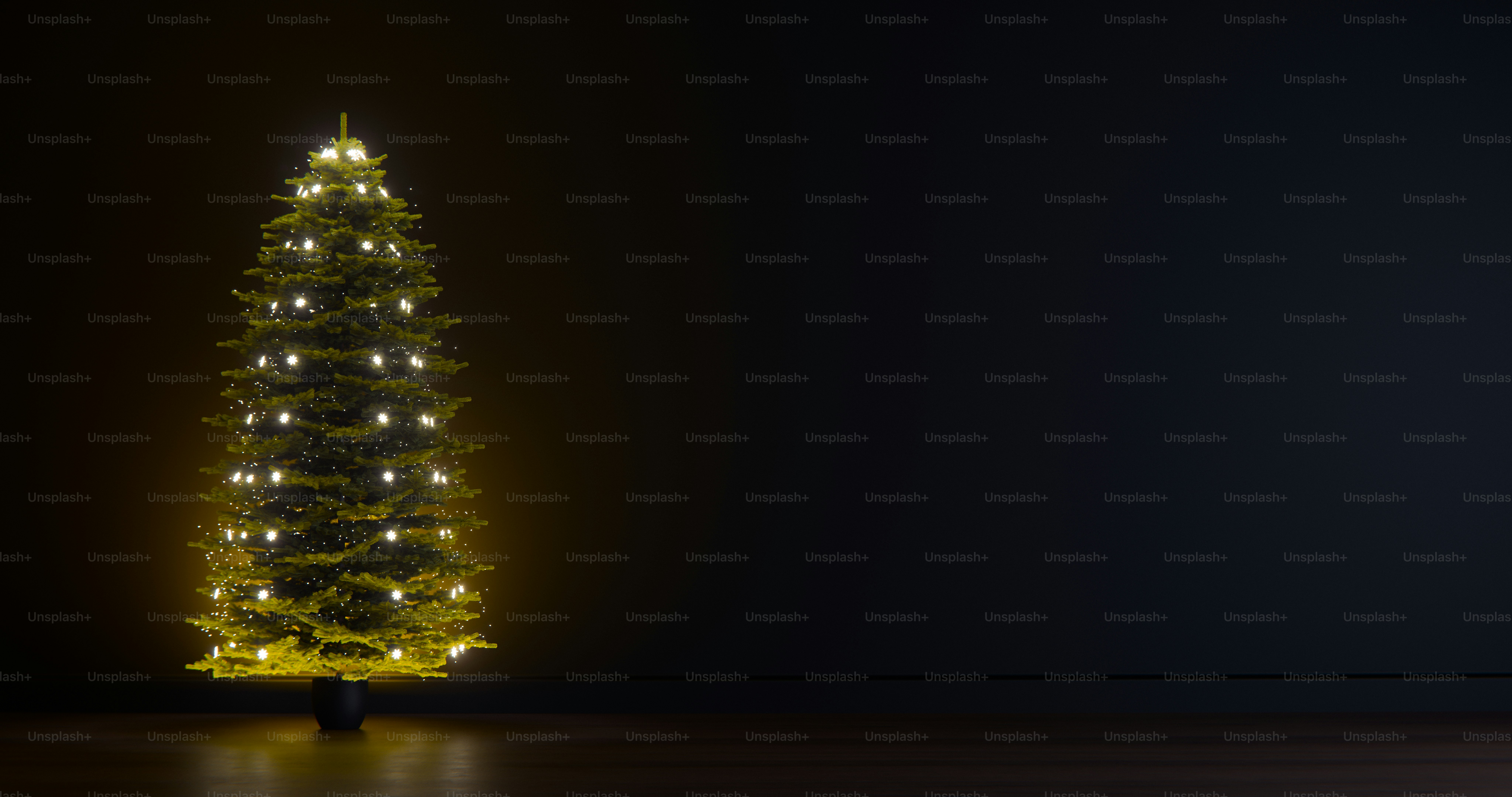 A glowing Christmas tree with white lights against a dark wall