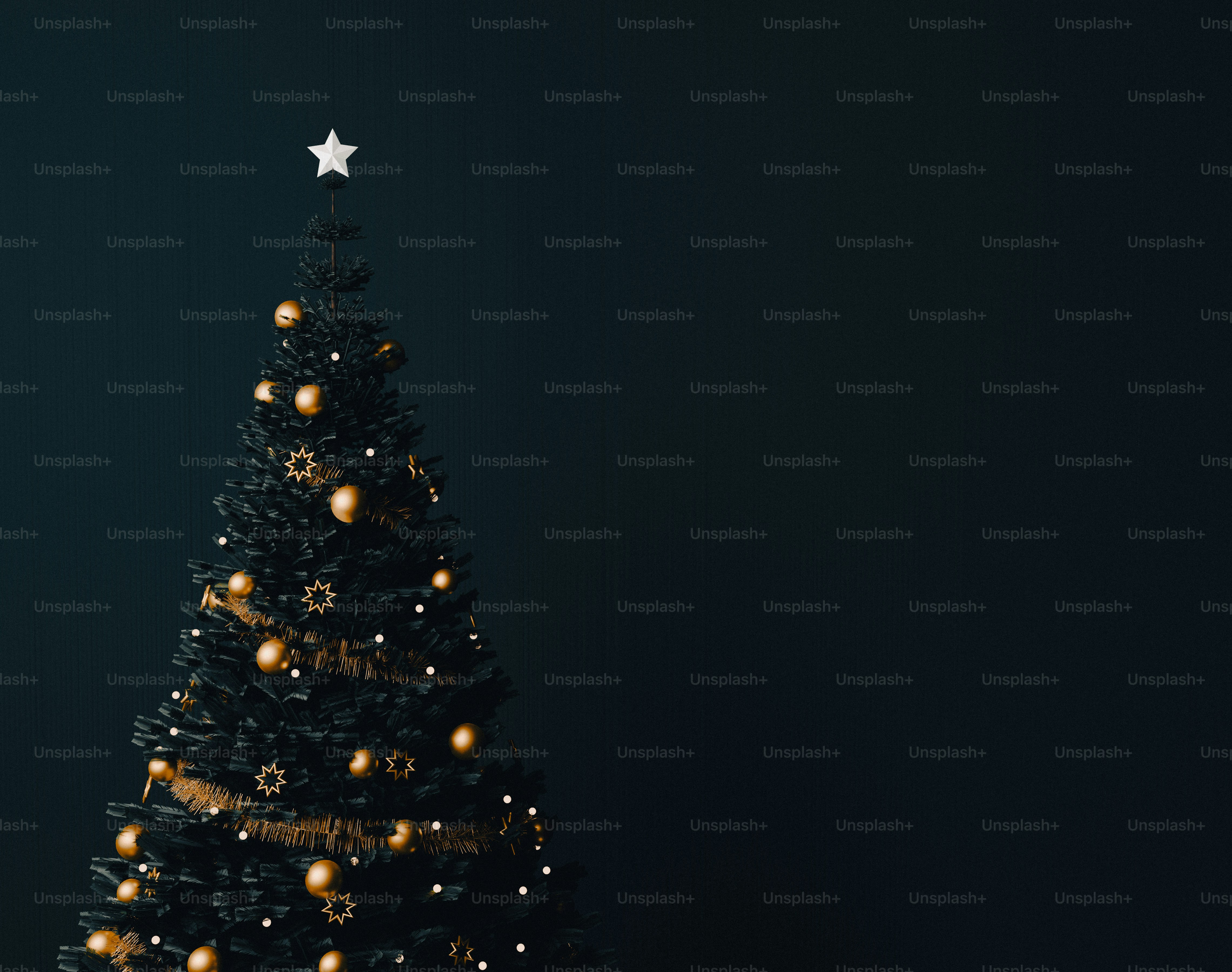 A dark Christmas tree decorated with gold ornaments and stars against a dark background