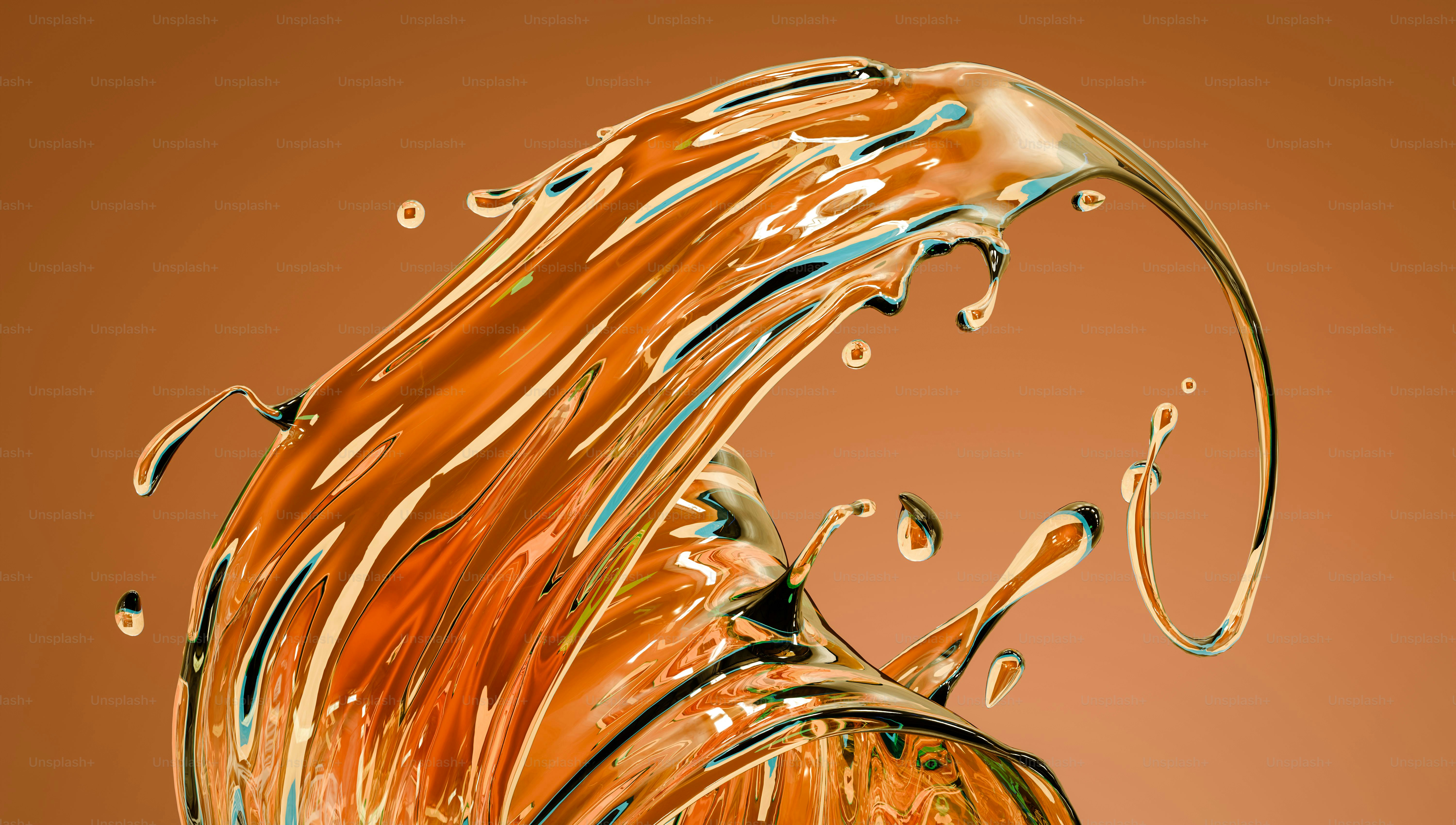 A splash of amber liquid with droplets against a solid orange background
