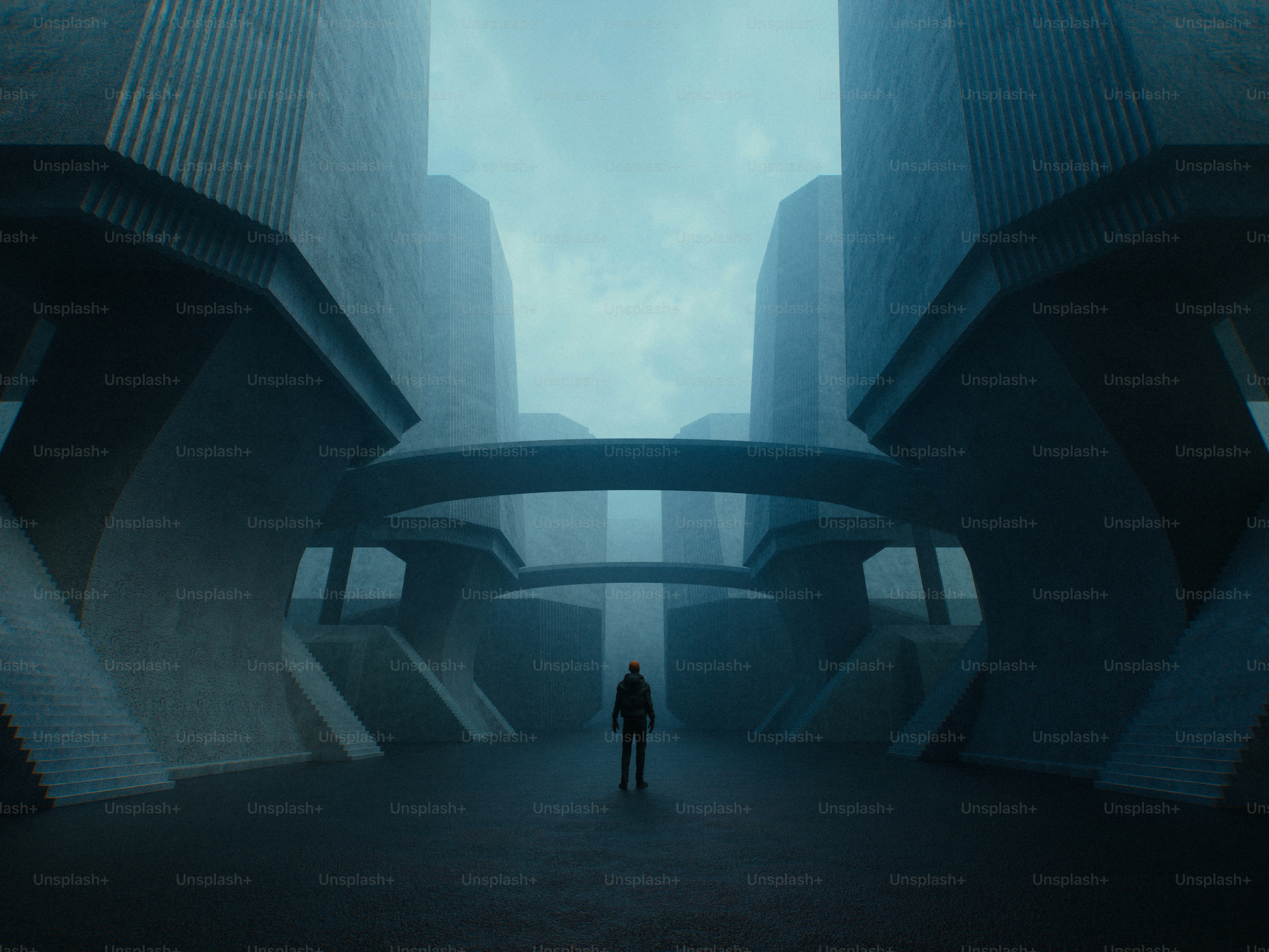 A person in a dark jacket walking between massive concrete structures with arched bridges