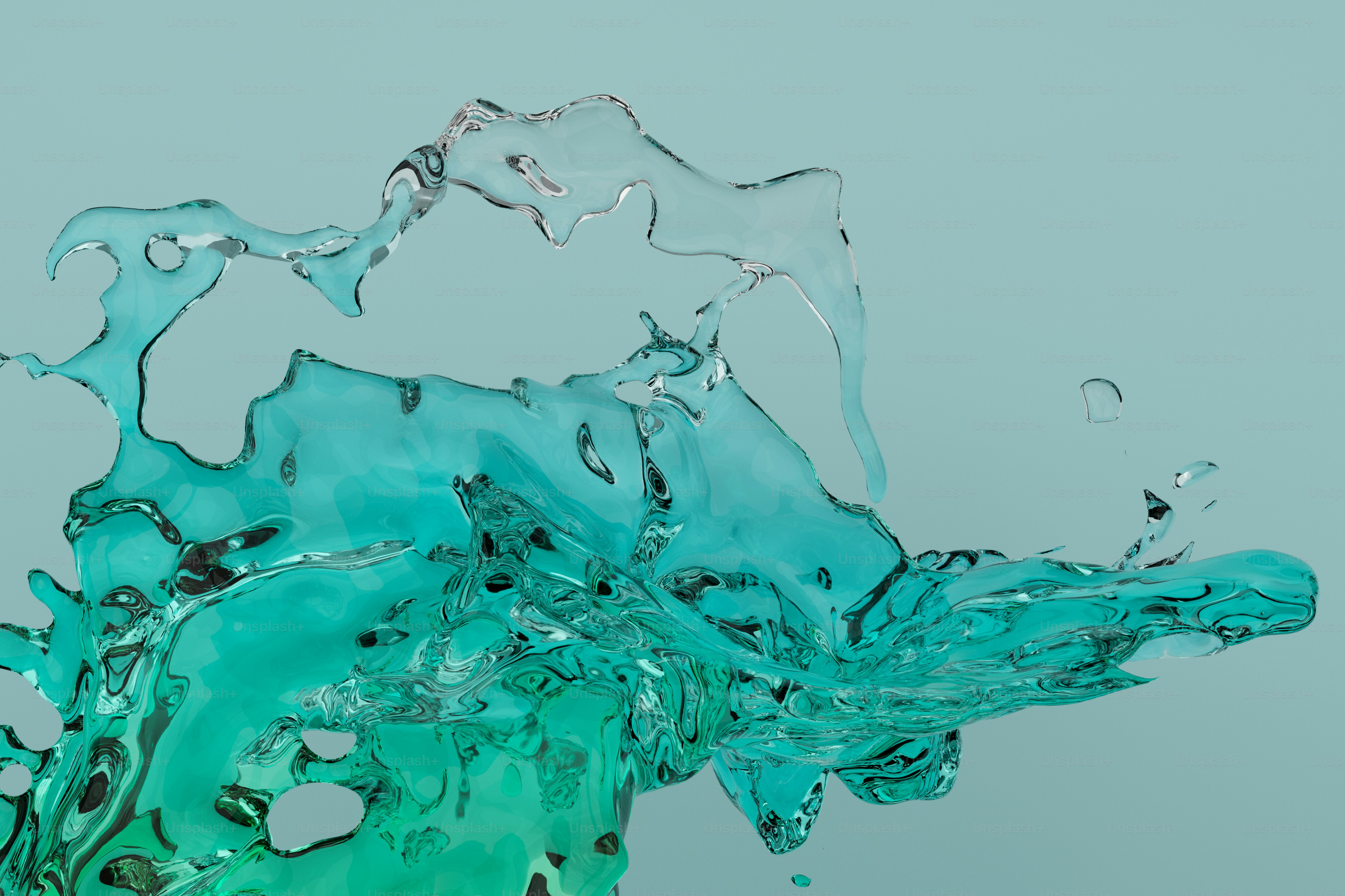 A splash of translucent turquoise water against a solid light blue background