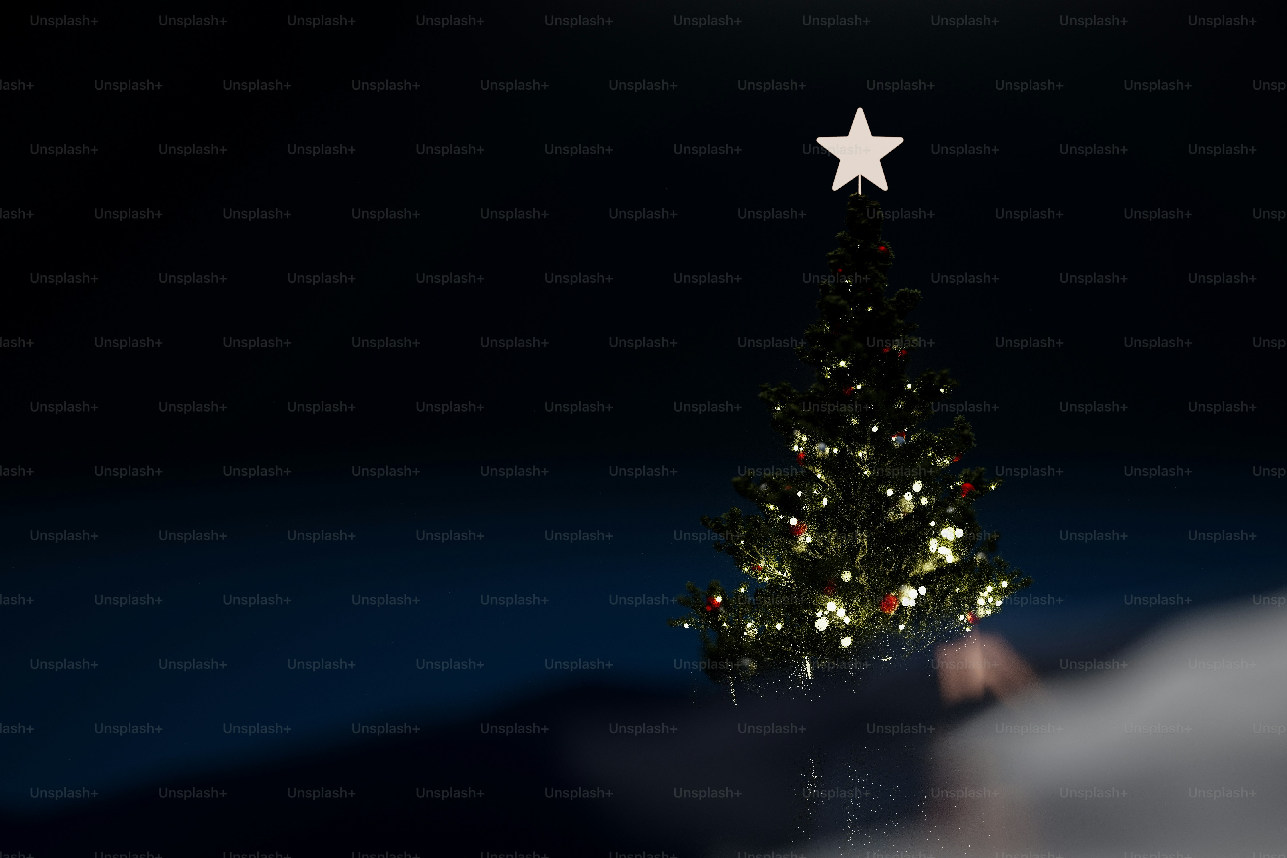 Decorated Christmas tree with glowing lights - Photo on Unsplash+