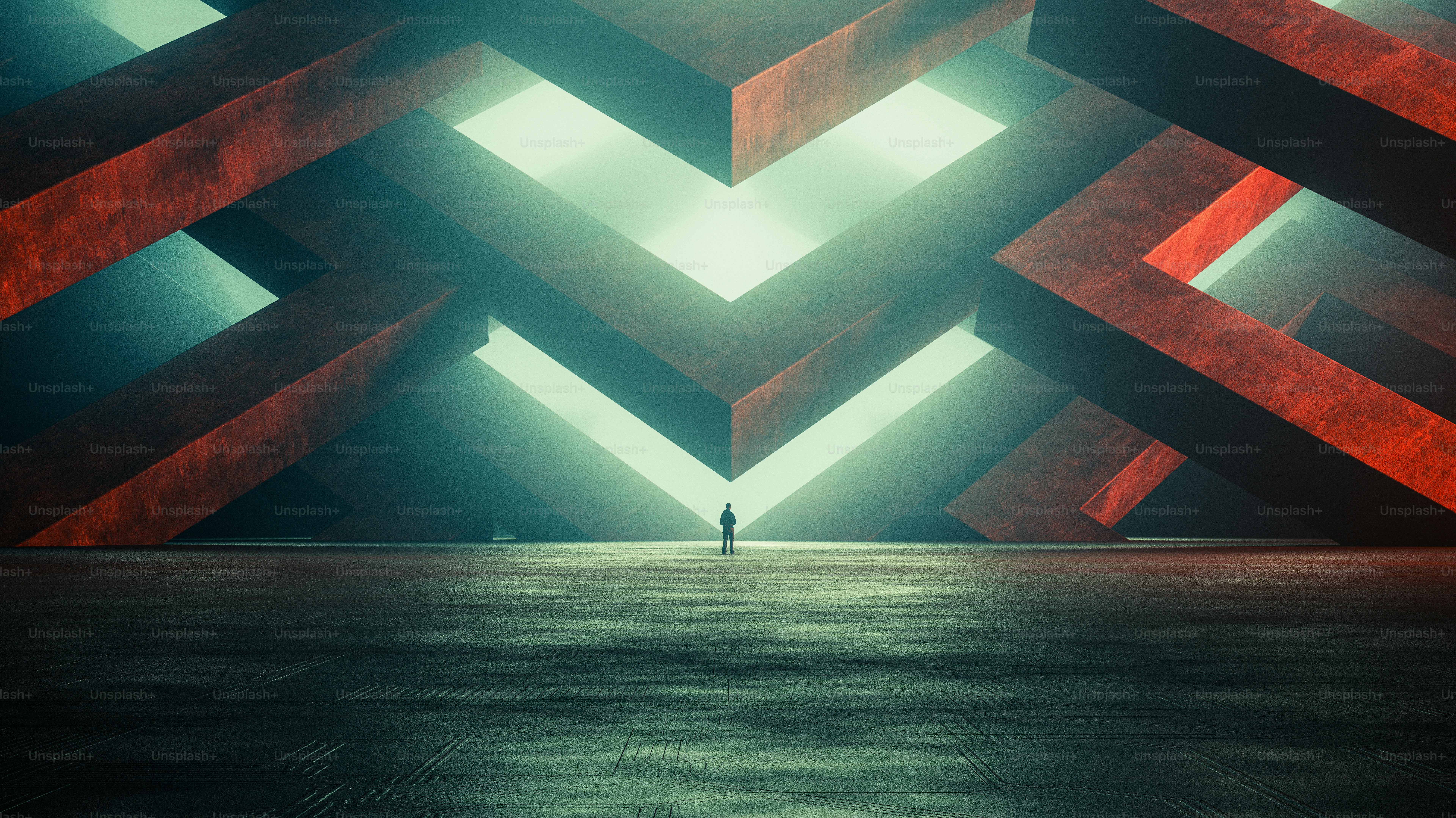 A person standing before large geometric red structures in a misty green space
