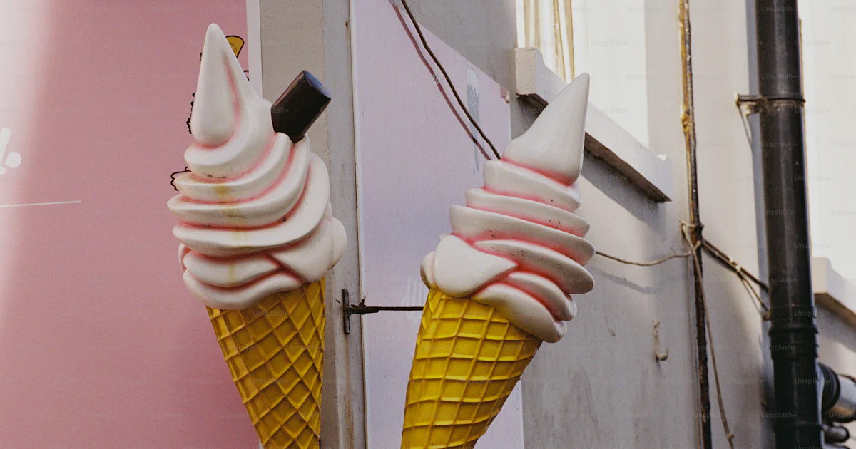 Panel Mount Compass Ice cream cone sculptures on wall - Photo on Unsplash+