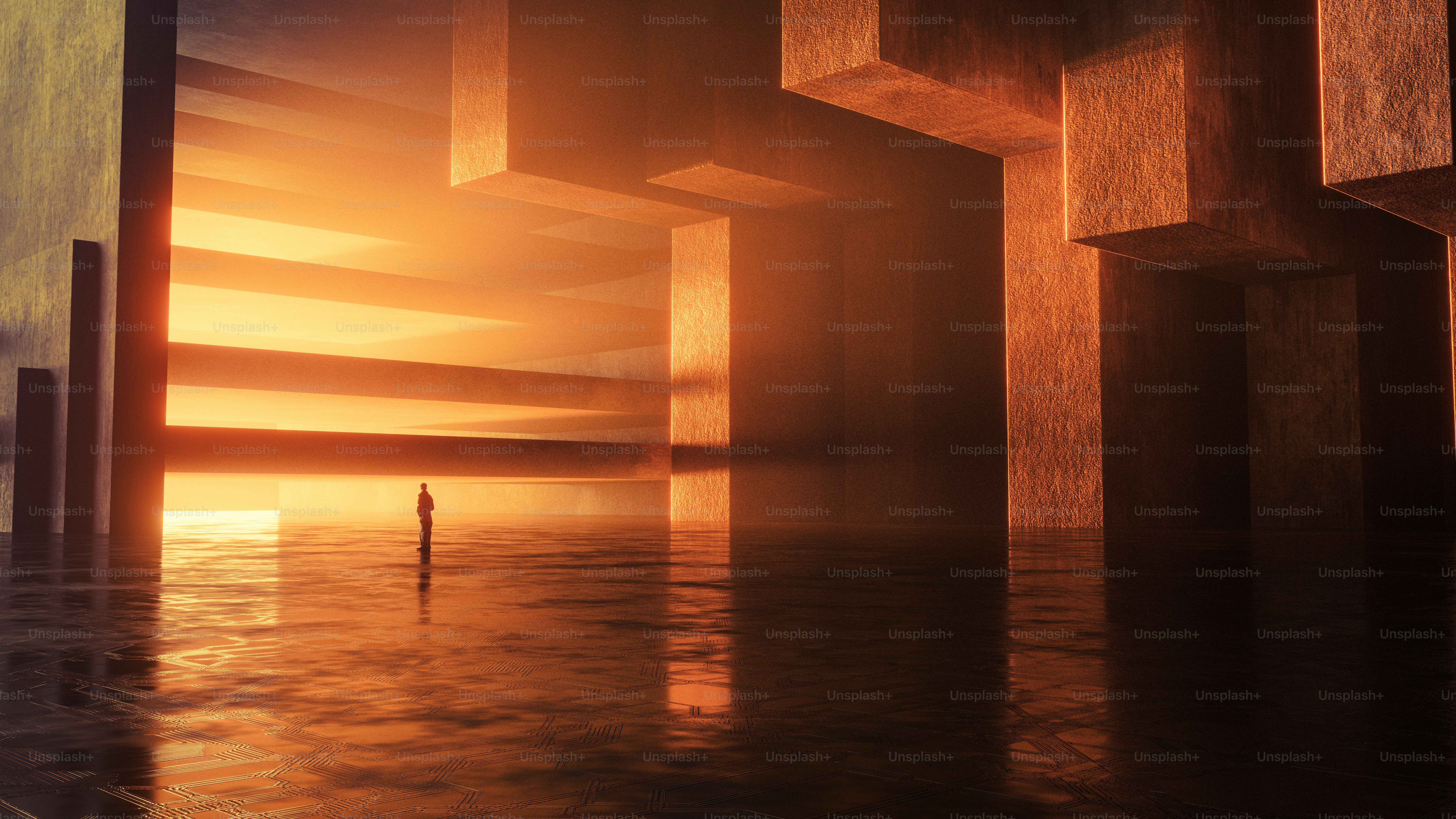 A person in a vast concrete hall with warm orange light and reflections