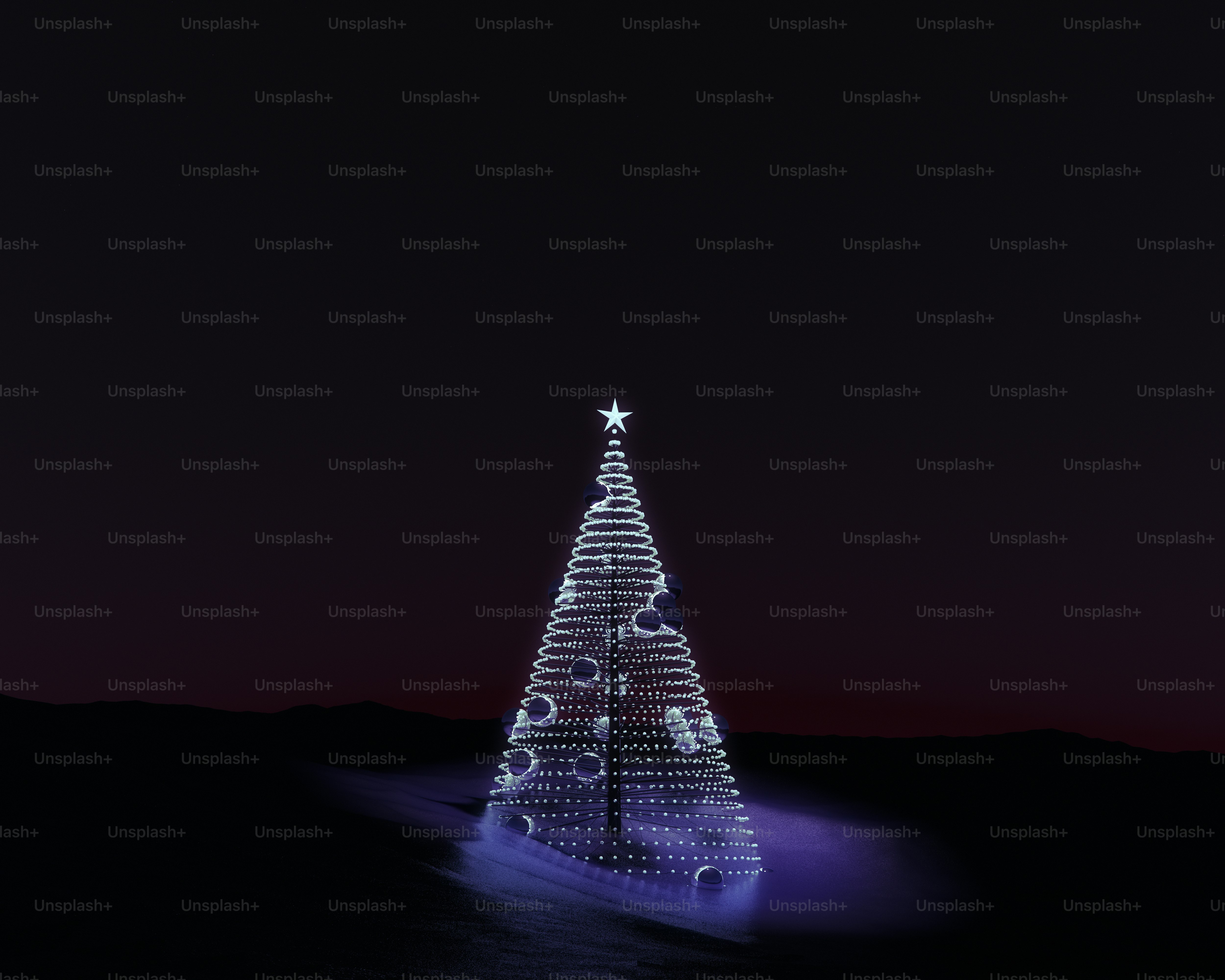 A conical Christmas tree made of white lights against a dark night sky
