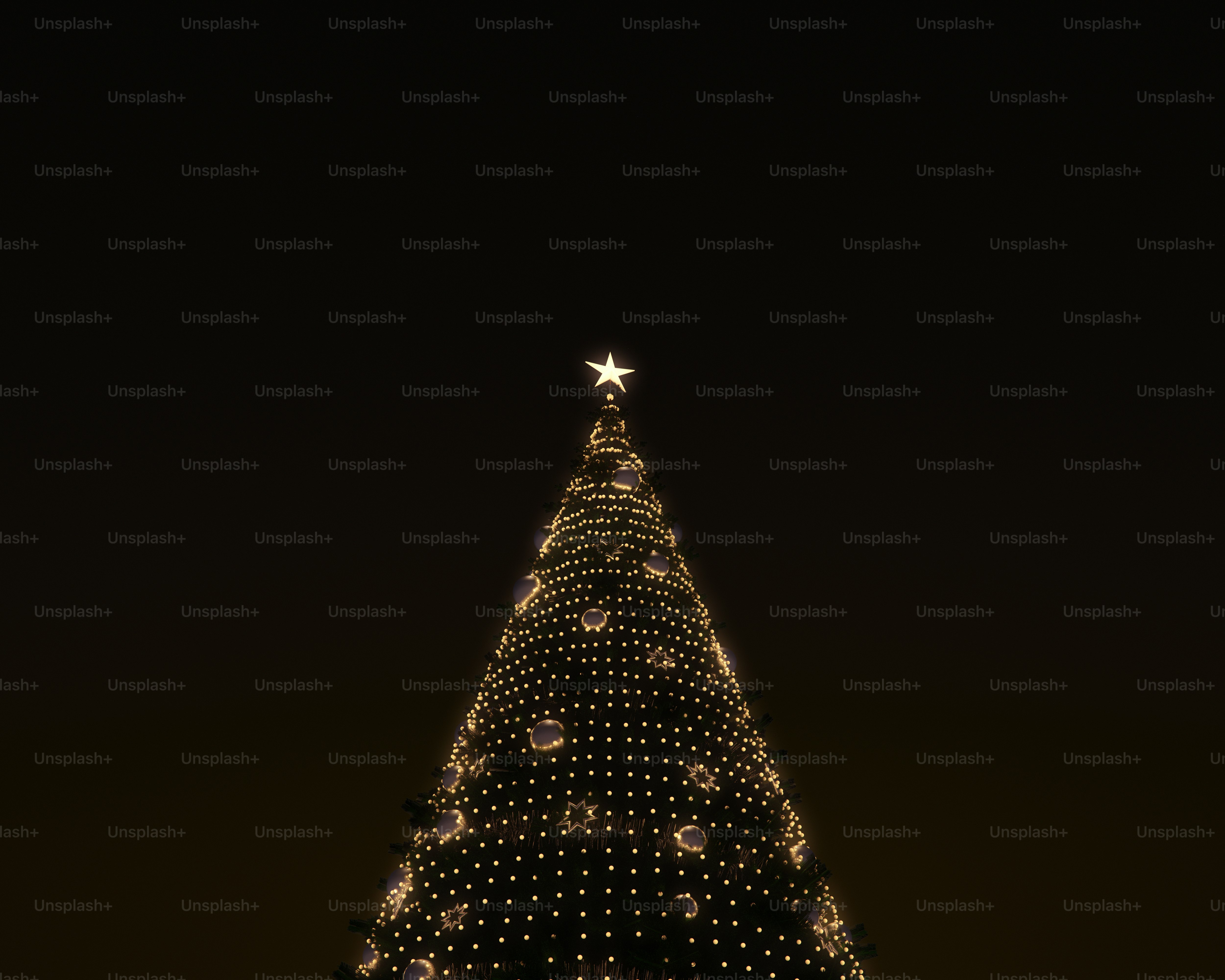 A Christmas tree illuminated with warm fairy lights and ornaments against a dark background