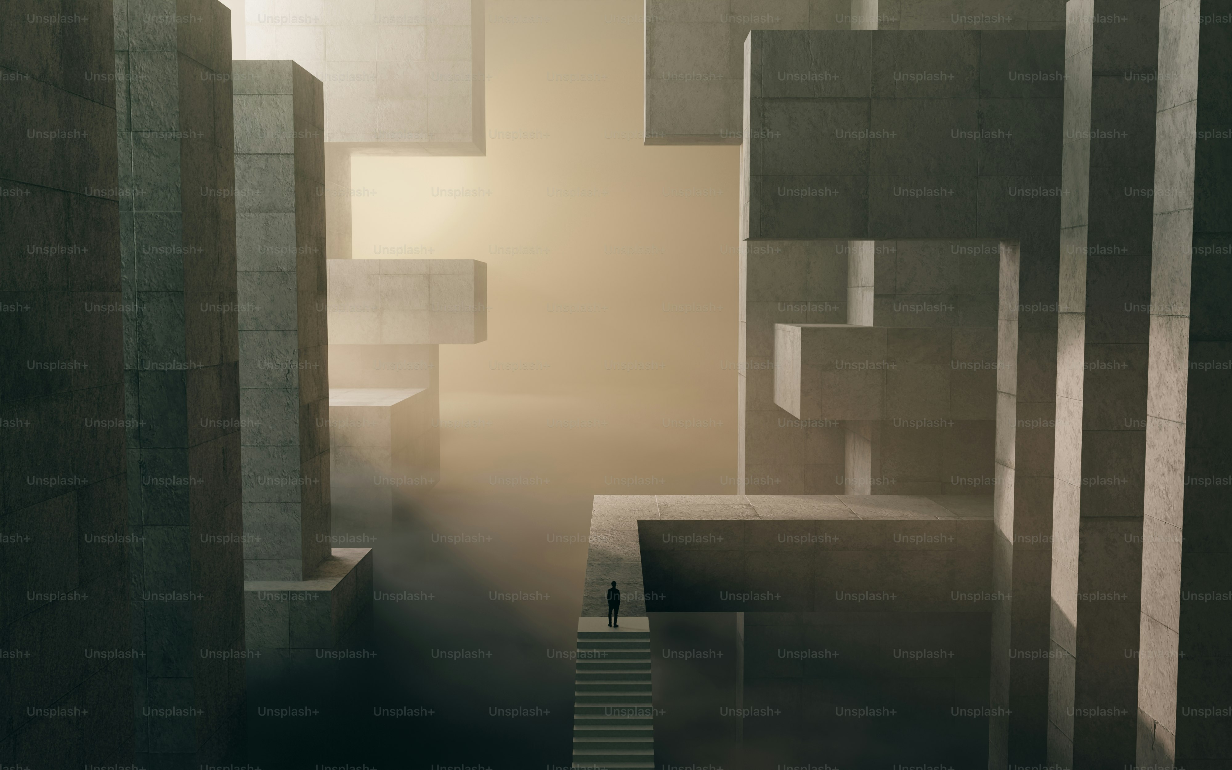 A person on a staircase among large concrete blocks in a misty space