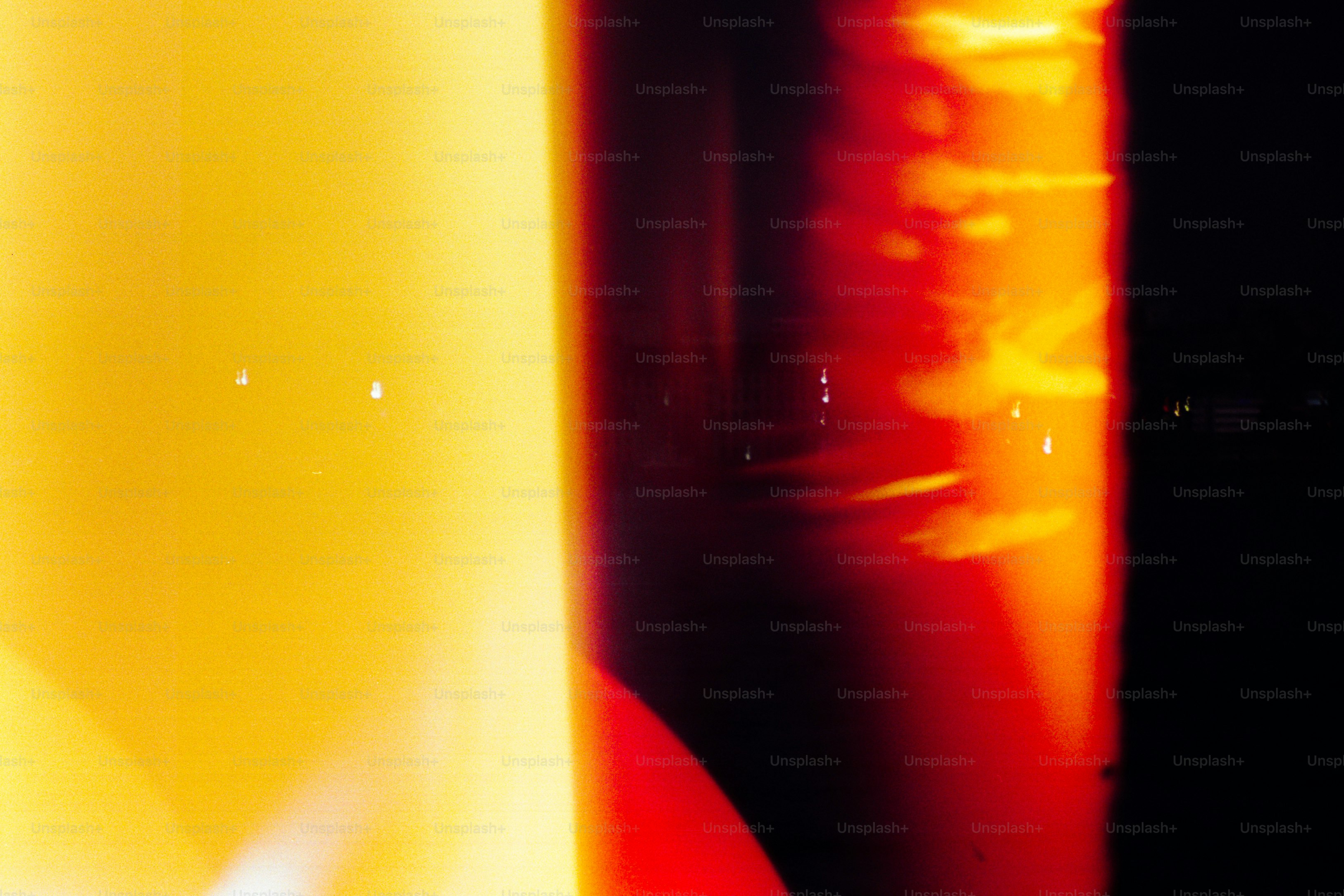 Abstract yellow and red light leaks - Photo on Unsplash+