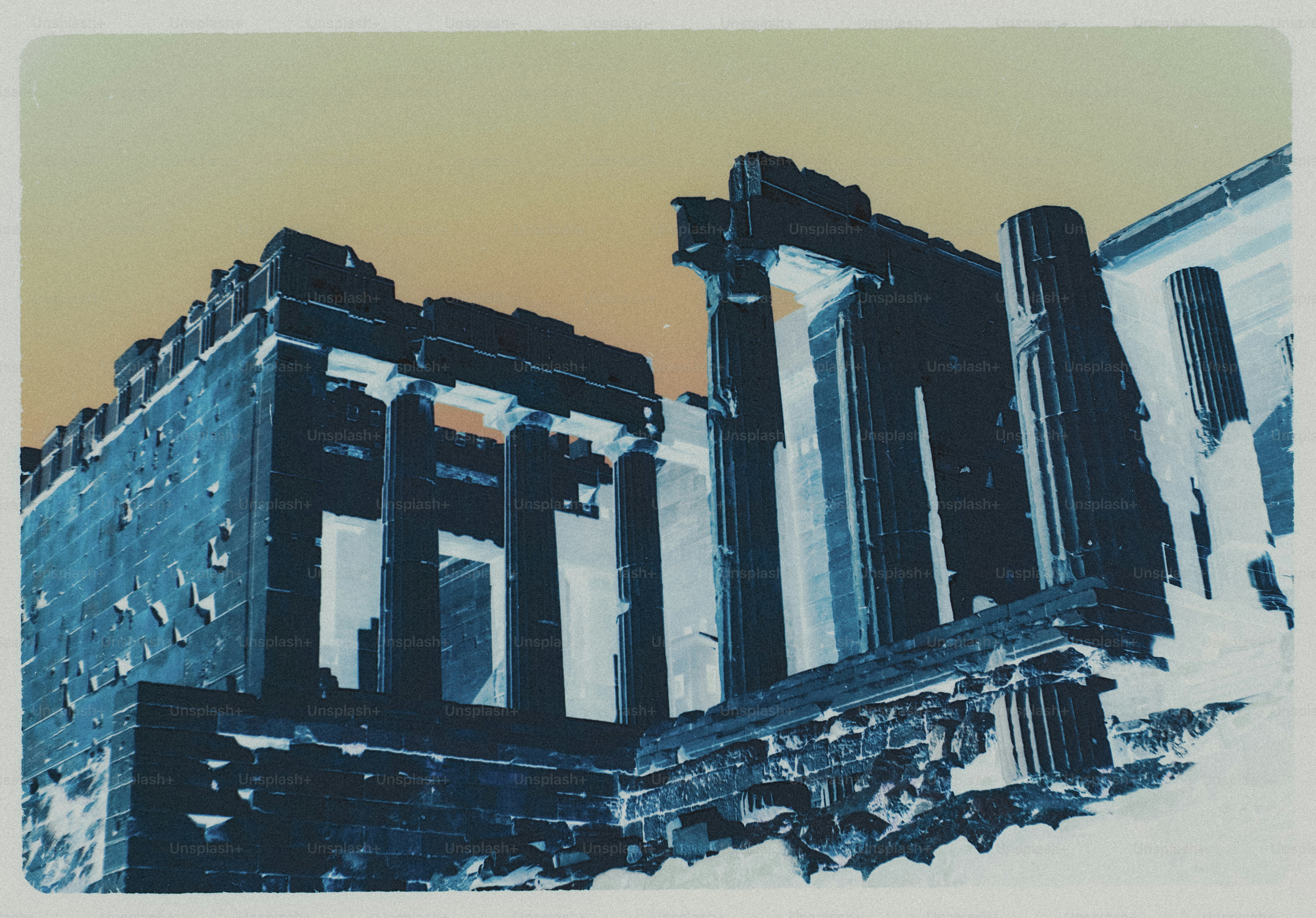 The Parthenon in Athens with inverted blue colors against a warm orange sky