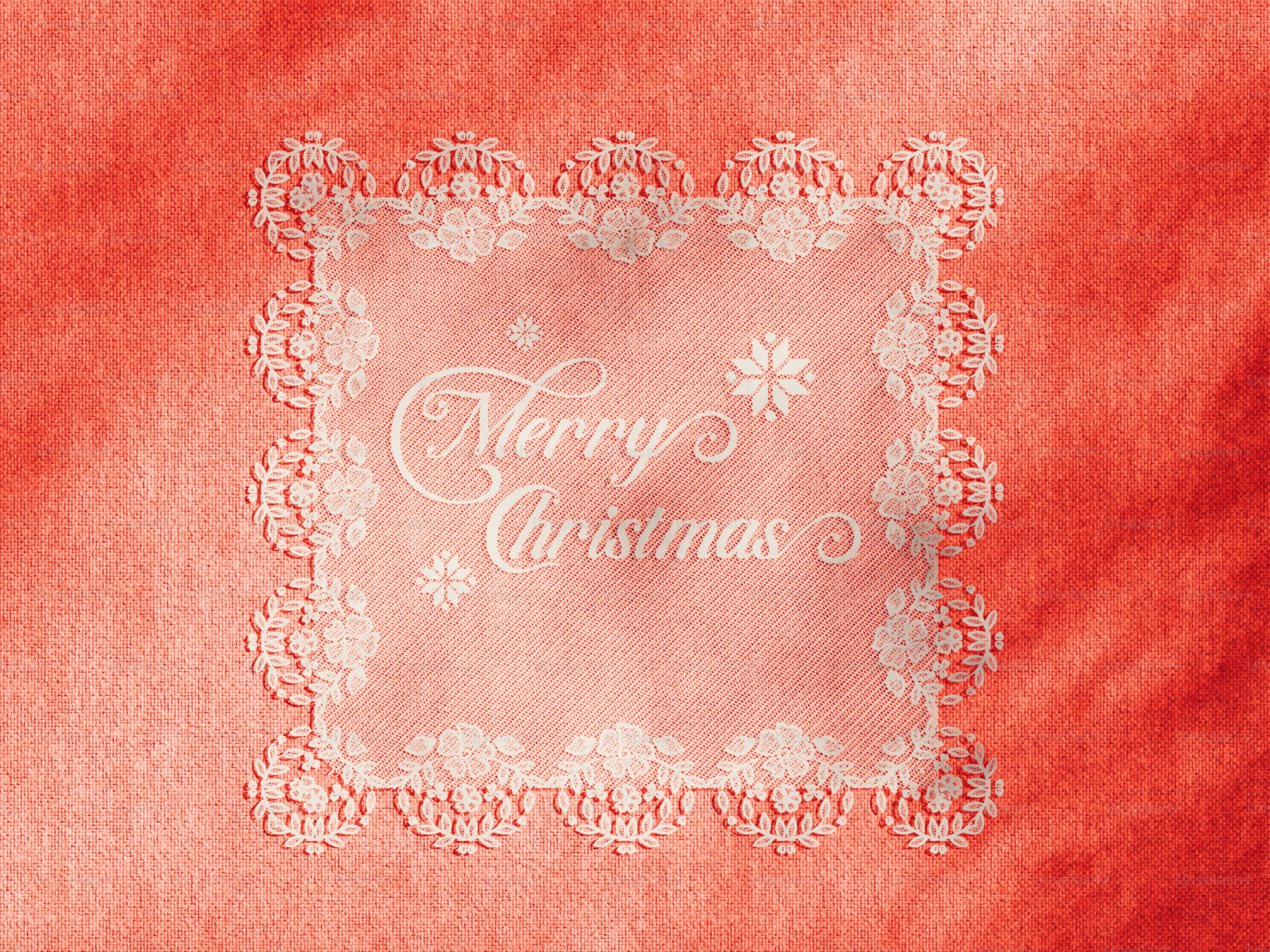 Borde de encaje blanco con texto de Feliz Navidad sobre un fondo rojo texturizado