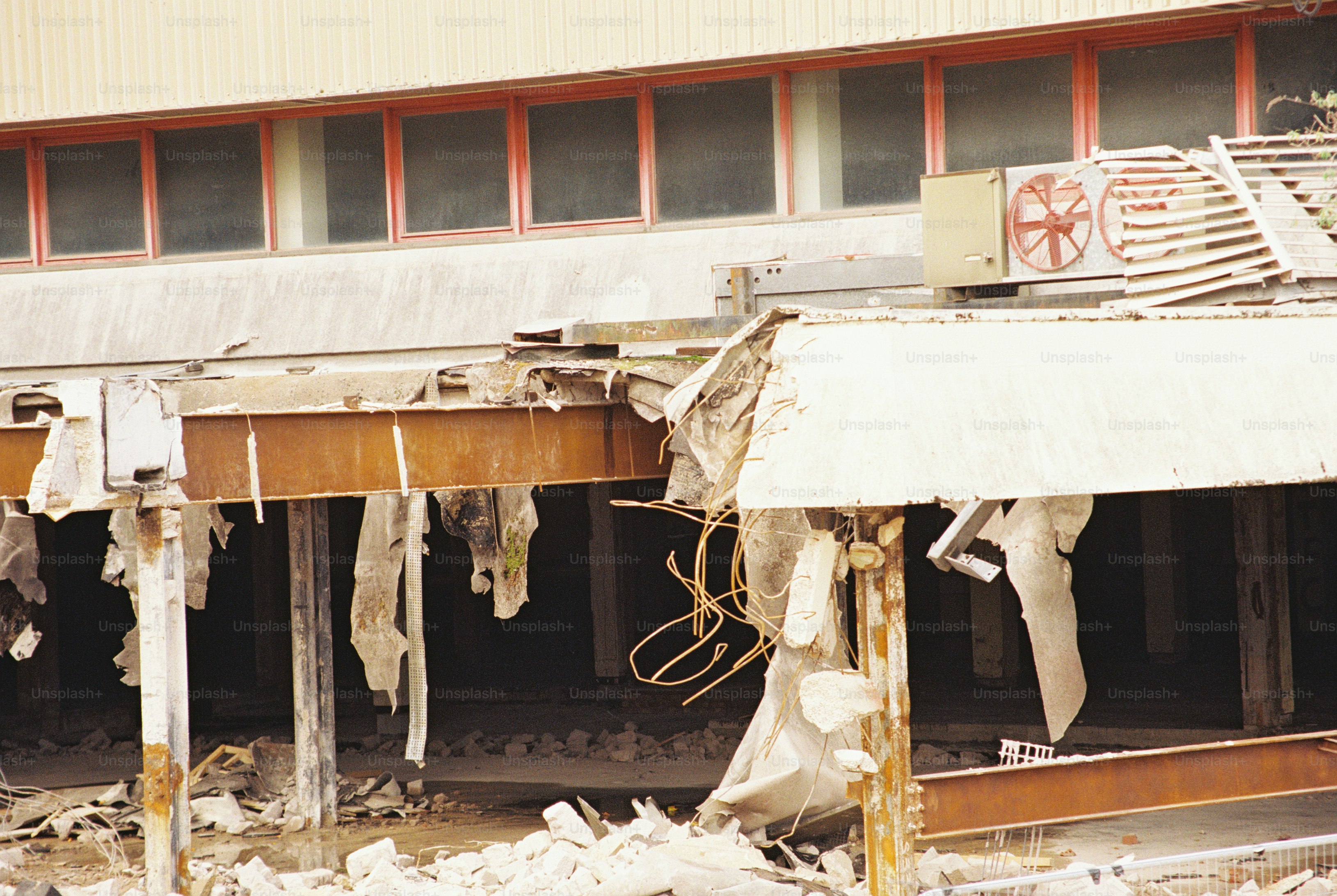 Damaged concrete canopy and steel beams - Photo on Unsplash+