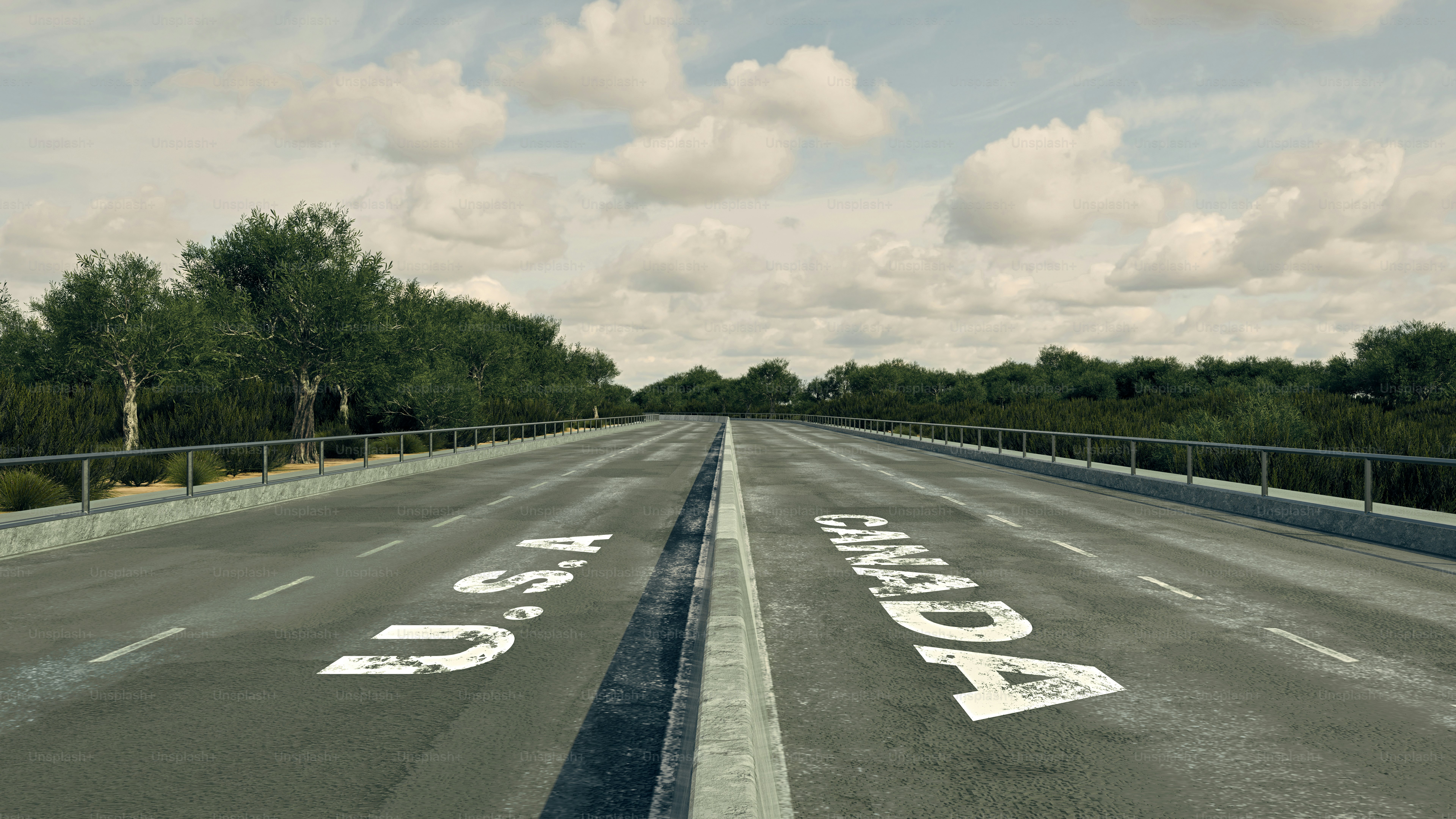 A 3D render of an empty highway with lanes marked "U.S.A." and "CANADA"