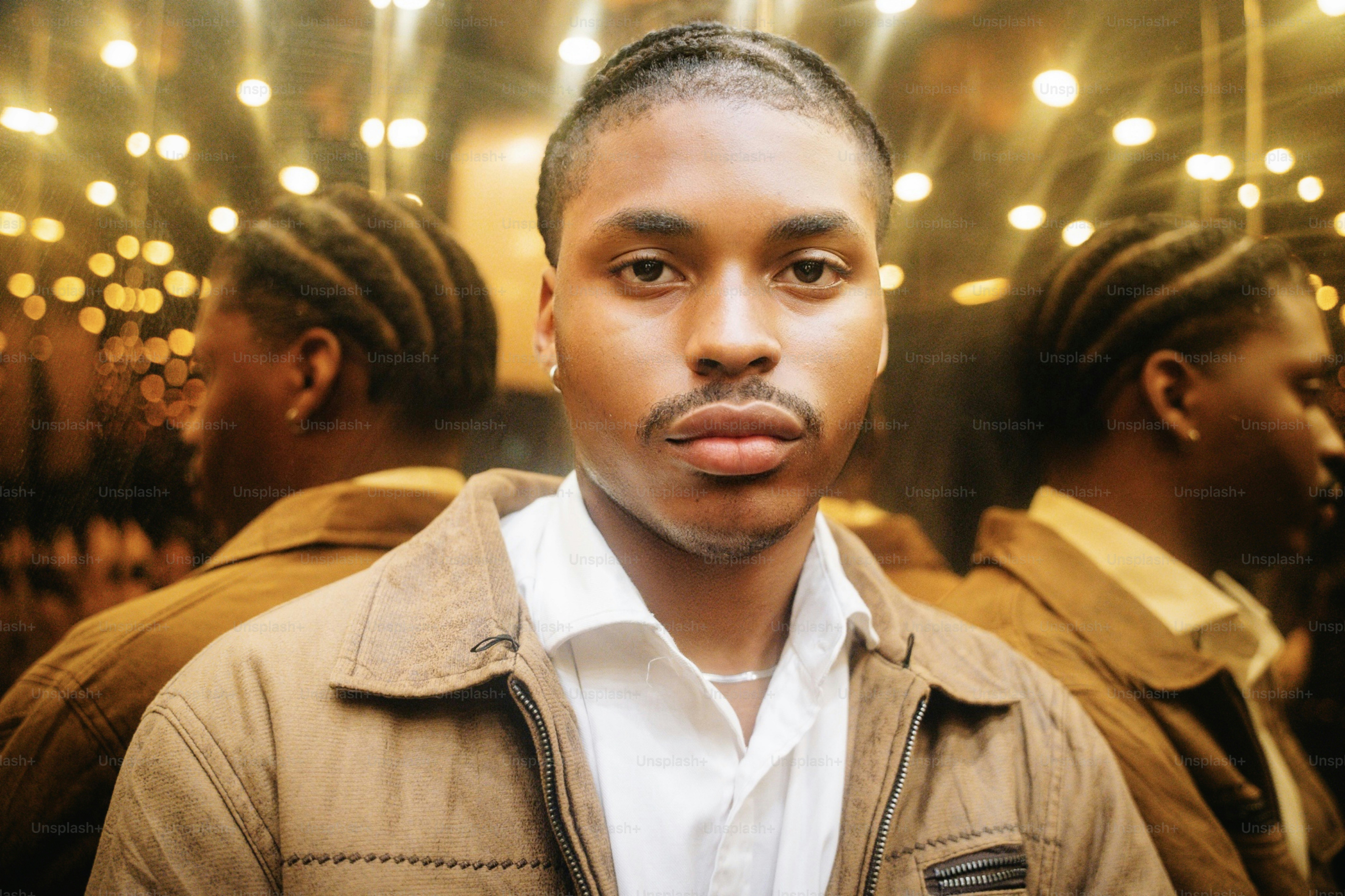 Young man in brown jacket - Photo on Unsplash+