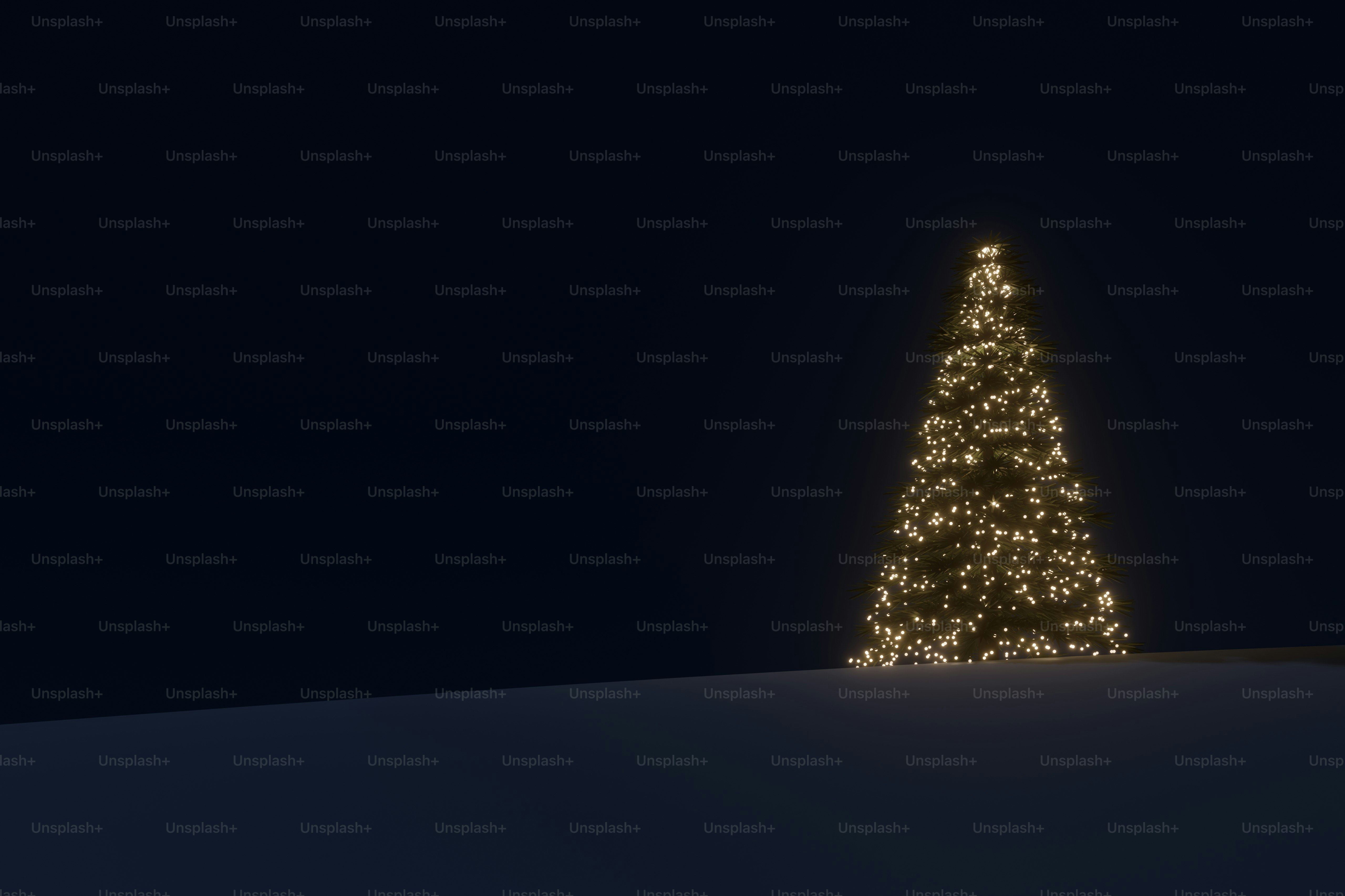Glowing christmas tree in dark landscape - Photo on Unsplash+
