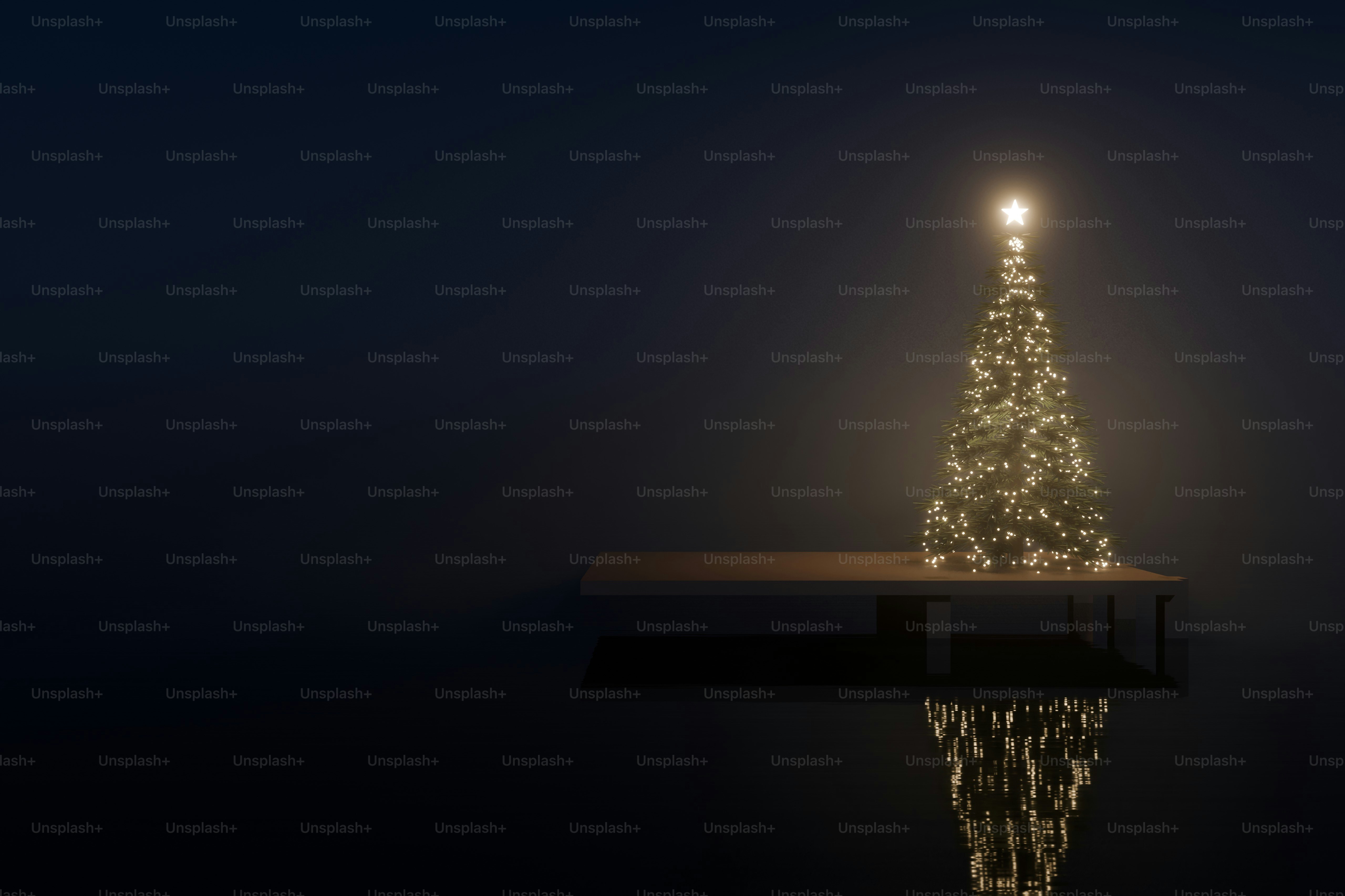 Glowing christmas tree in dark landscape - Photo on Unsplash+