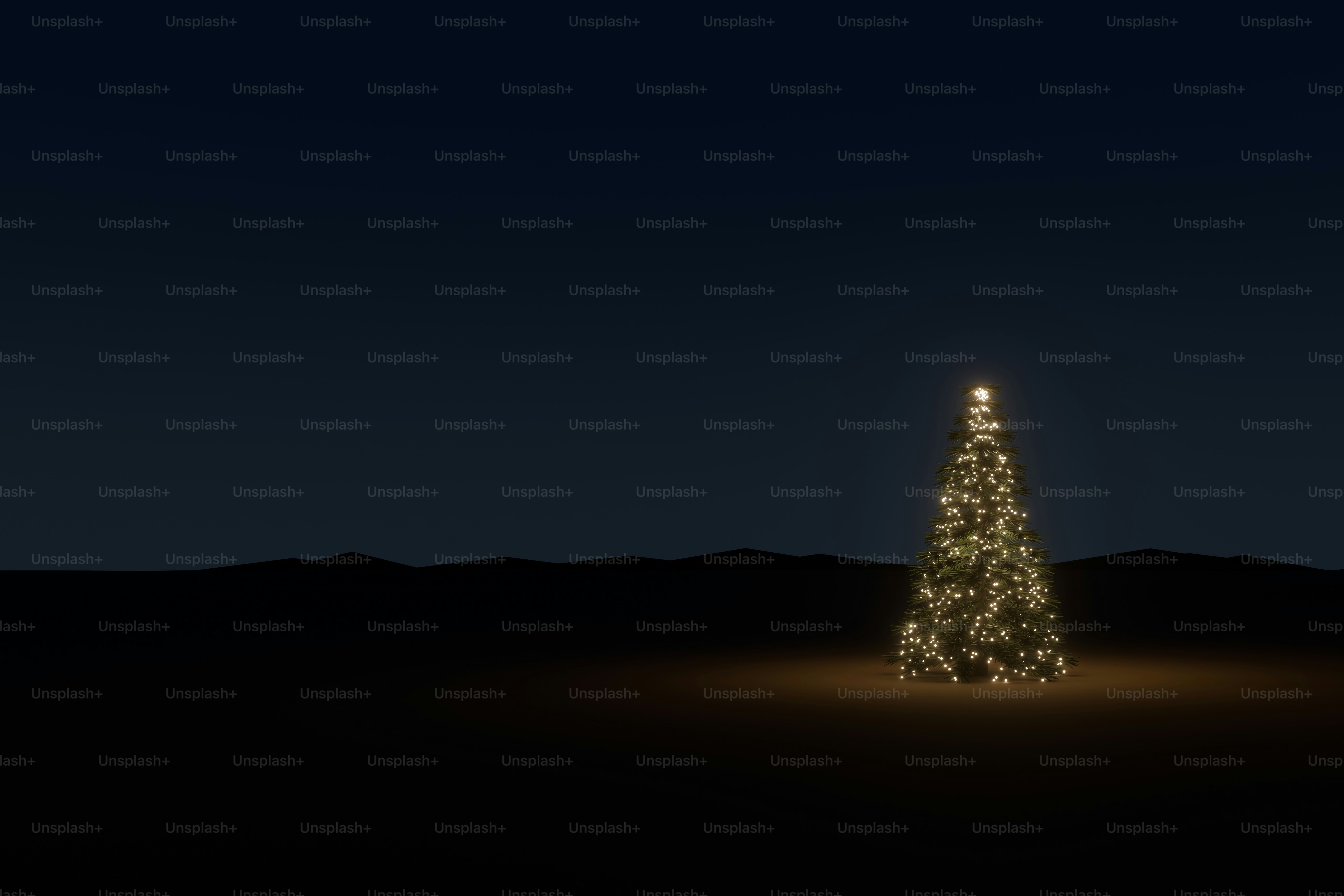 Glowing christmas tree in dark landscape - Photo on Unsplash+
