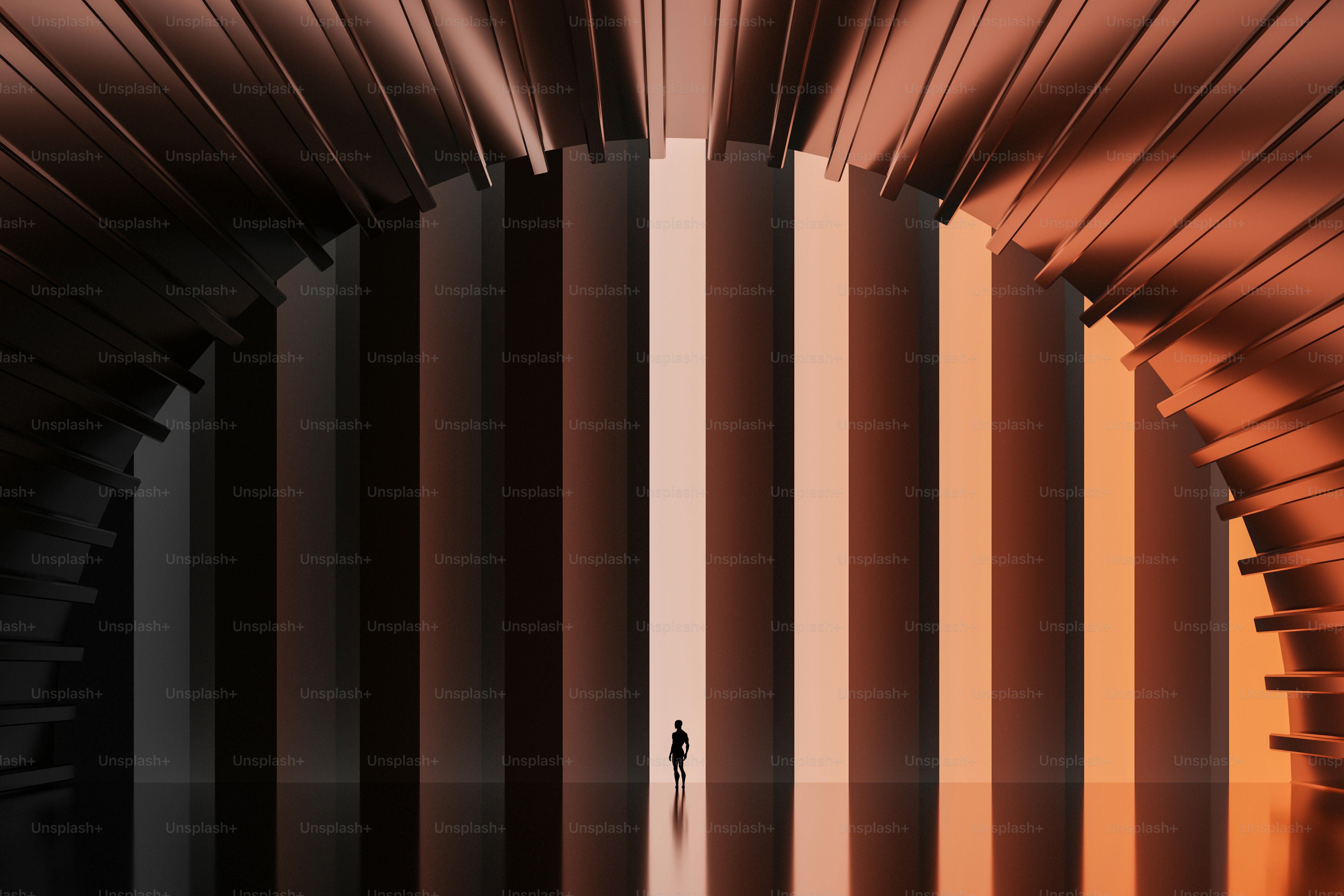Silhouette standing before metallic archway - Photo on Unsplash+
