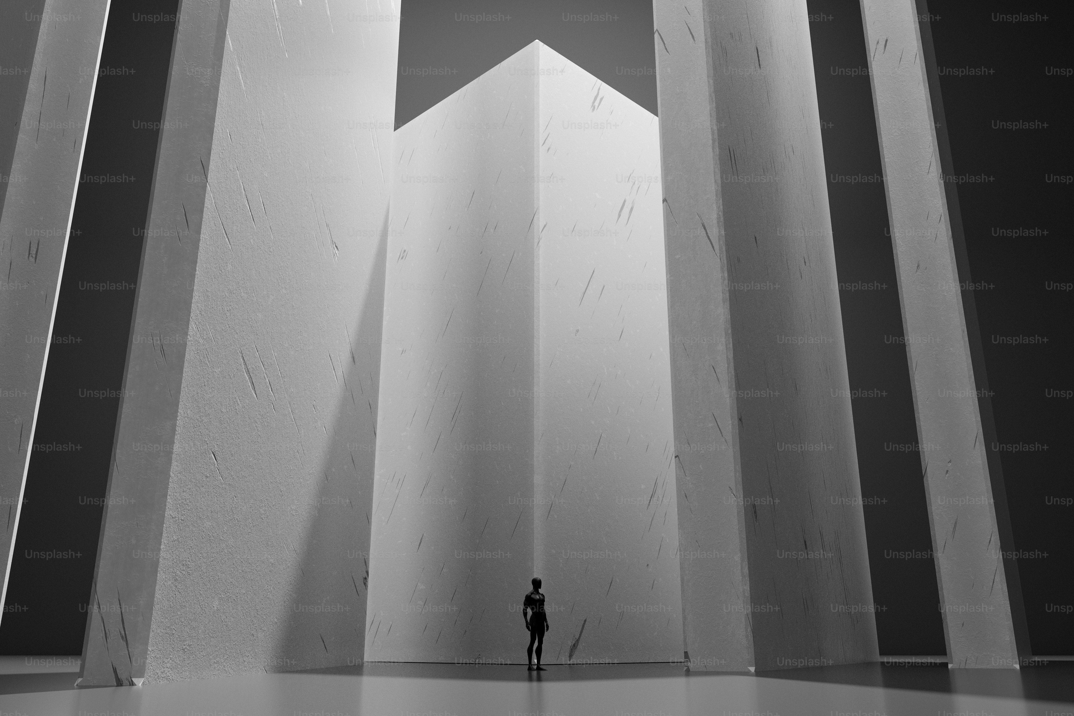 Un rendering 3D di una persona solitaria in piedi davanti a giganteschi monoliti bianchi in uno spazio buio
