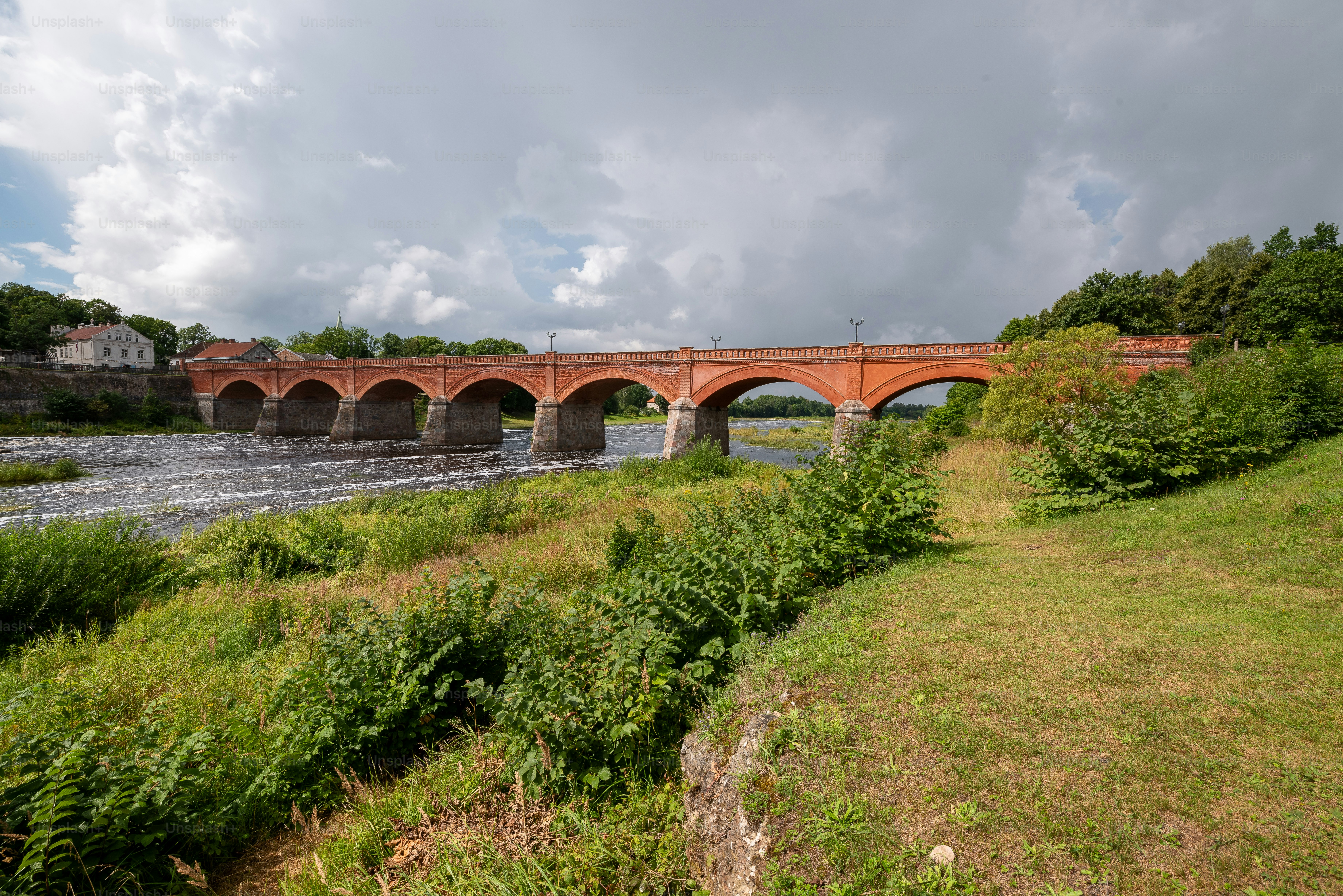 Brick bridge over Venta river Kuldīga - Photo on Unsplash+