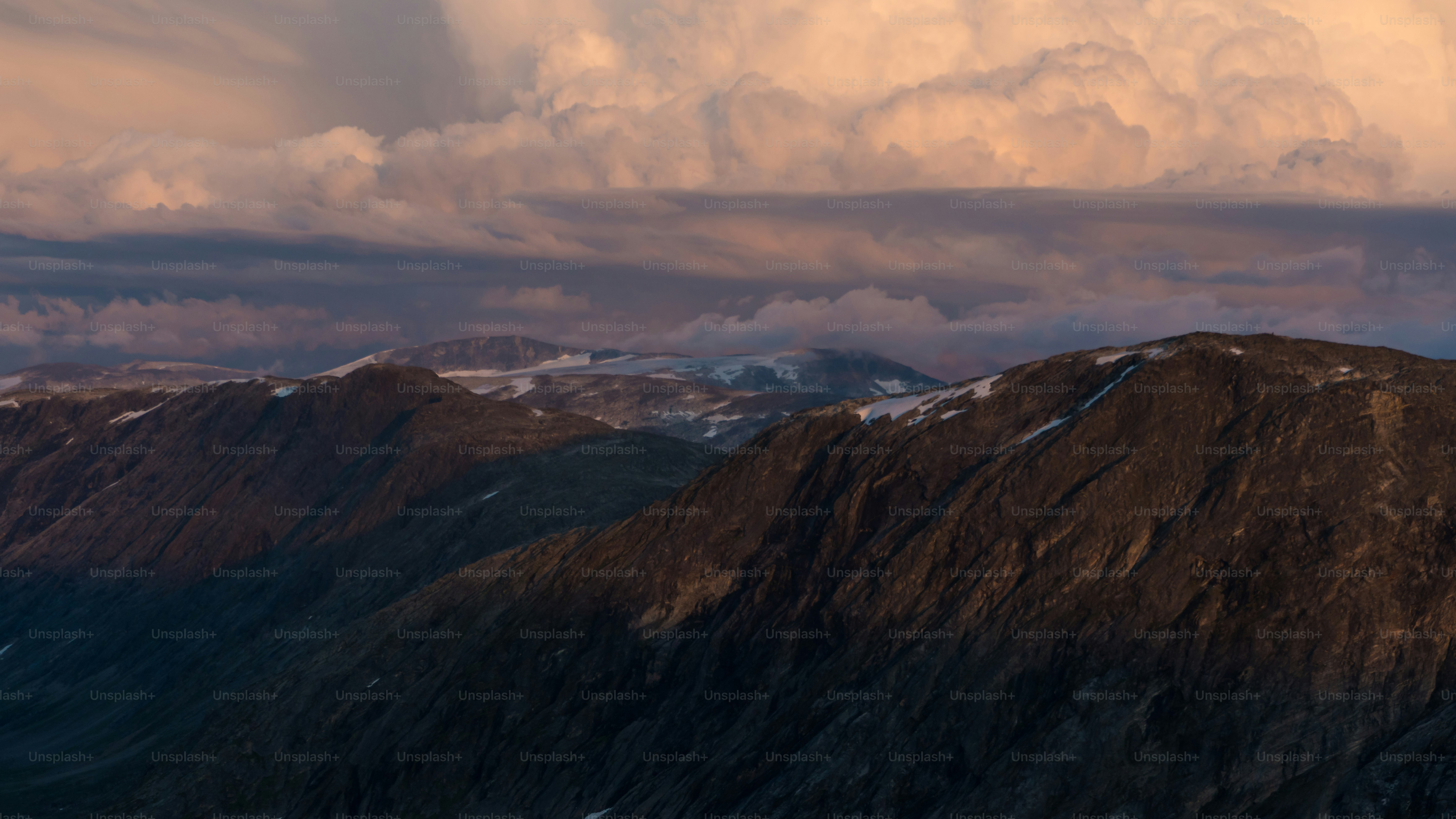 Mountain valley with river at golden hour - Photo on Unsplash+