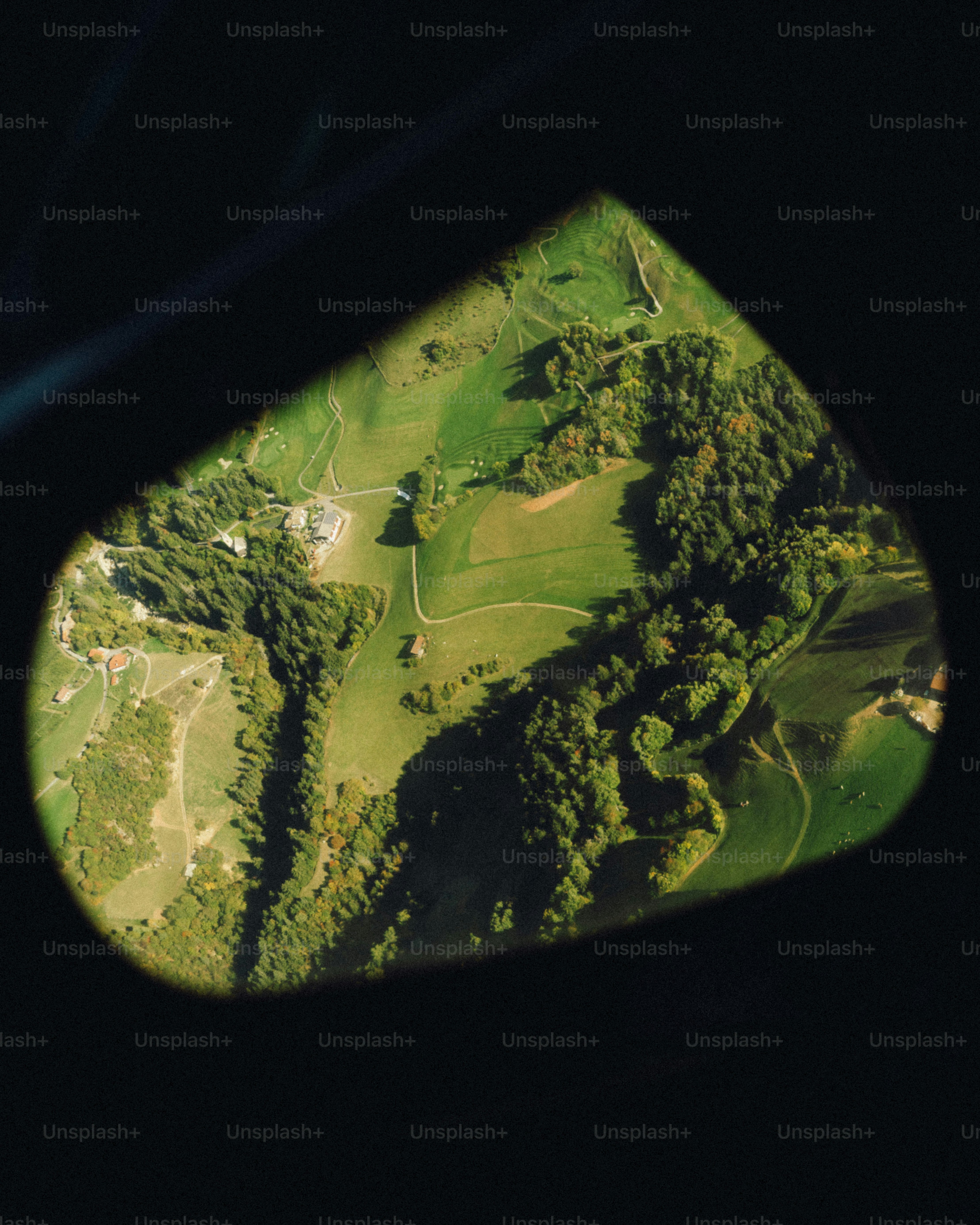 Aerial view of green landscape - Photo on Unsplash+