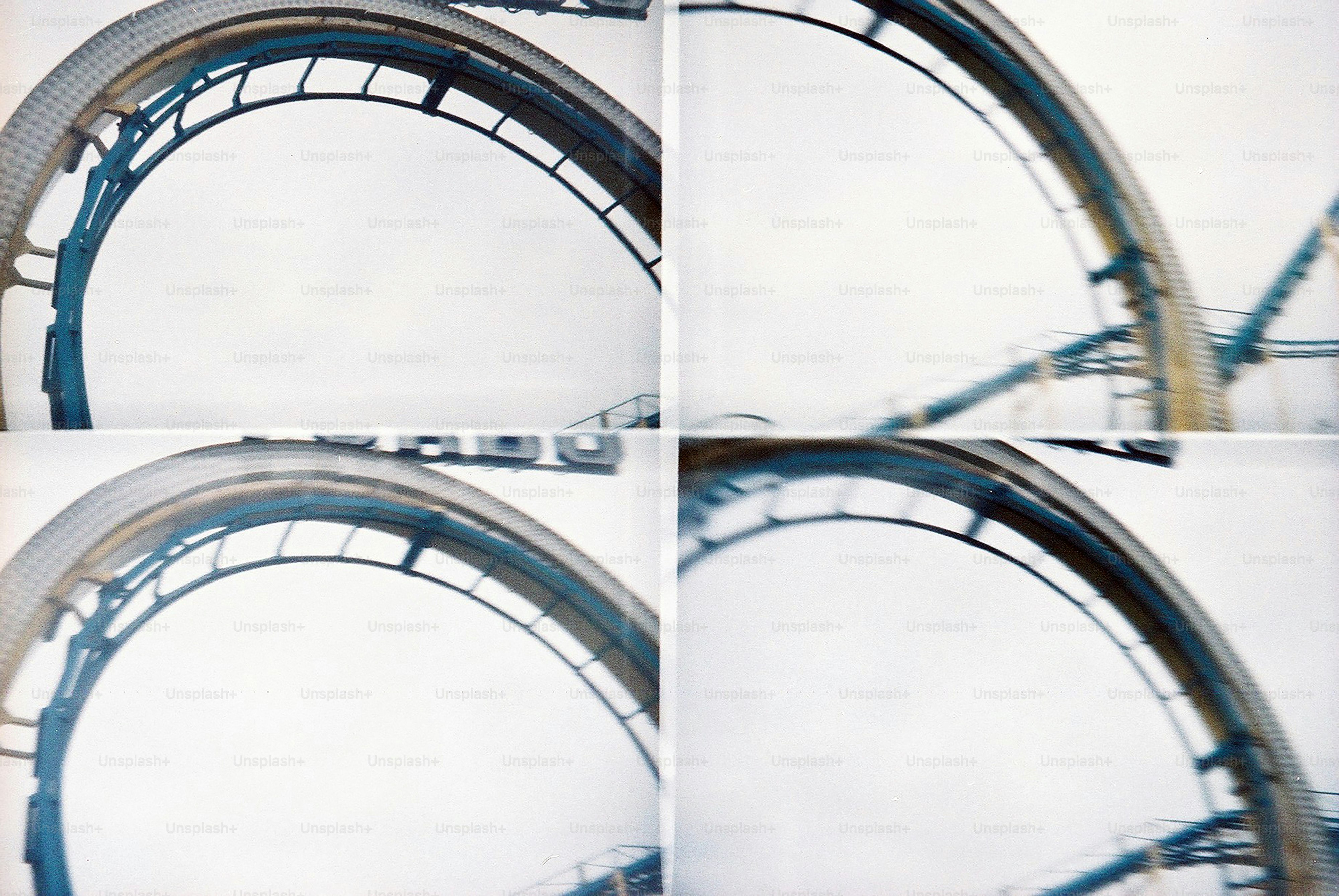 Roller coaster track in four panels - Photo on Unsplash+