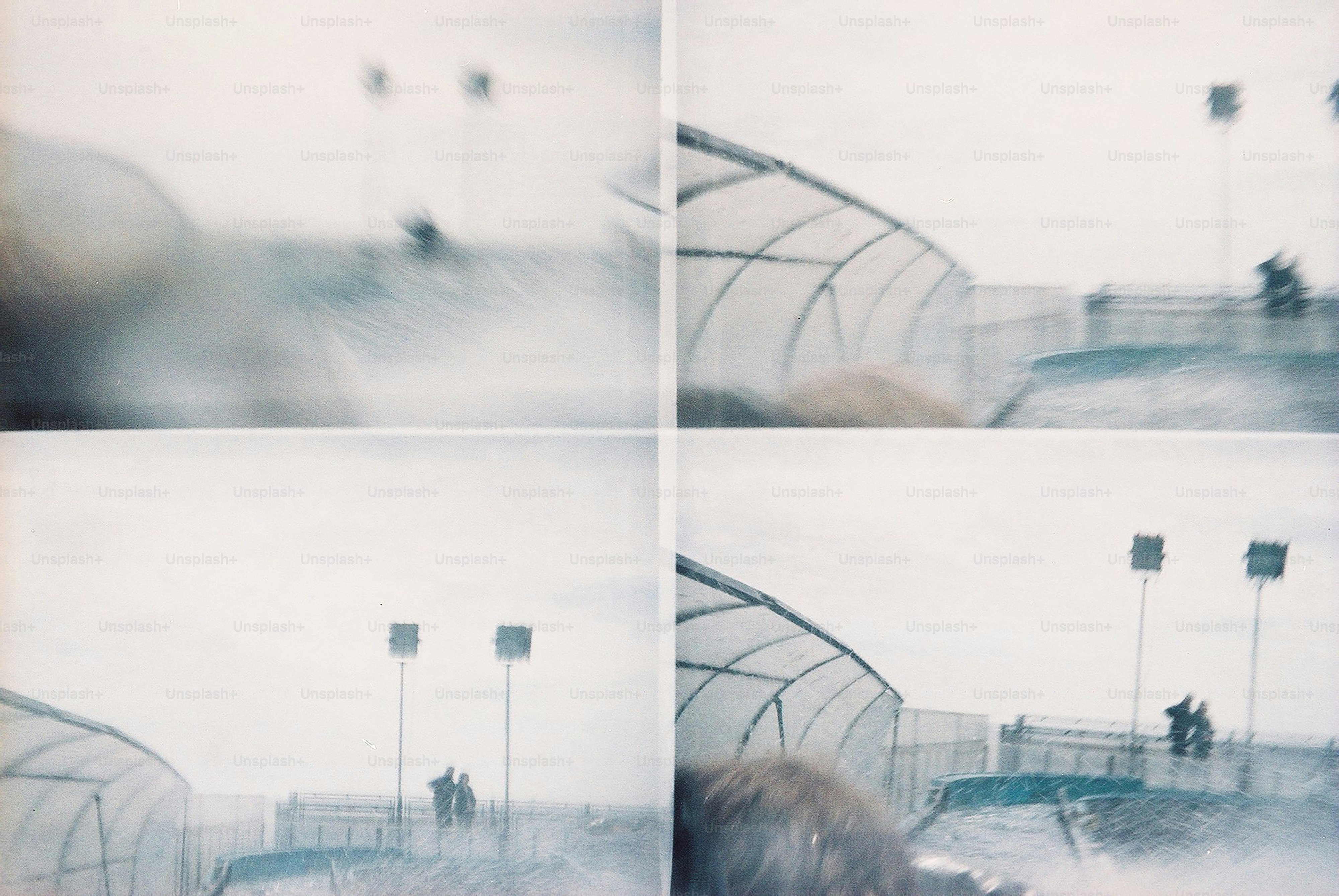 Blurred stadium lights and chain-link fence - Photo on Unsplash+