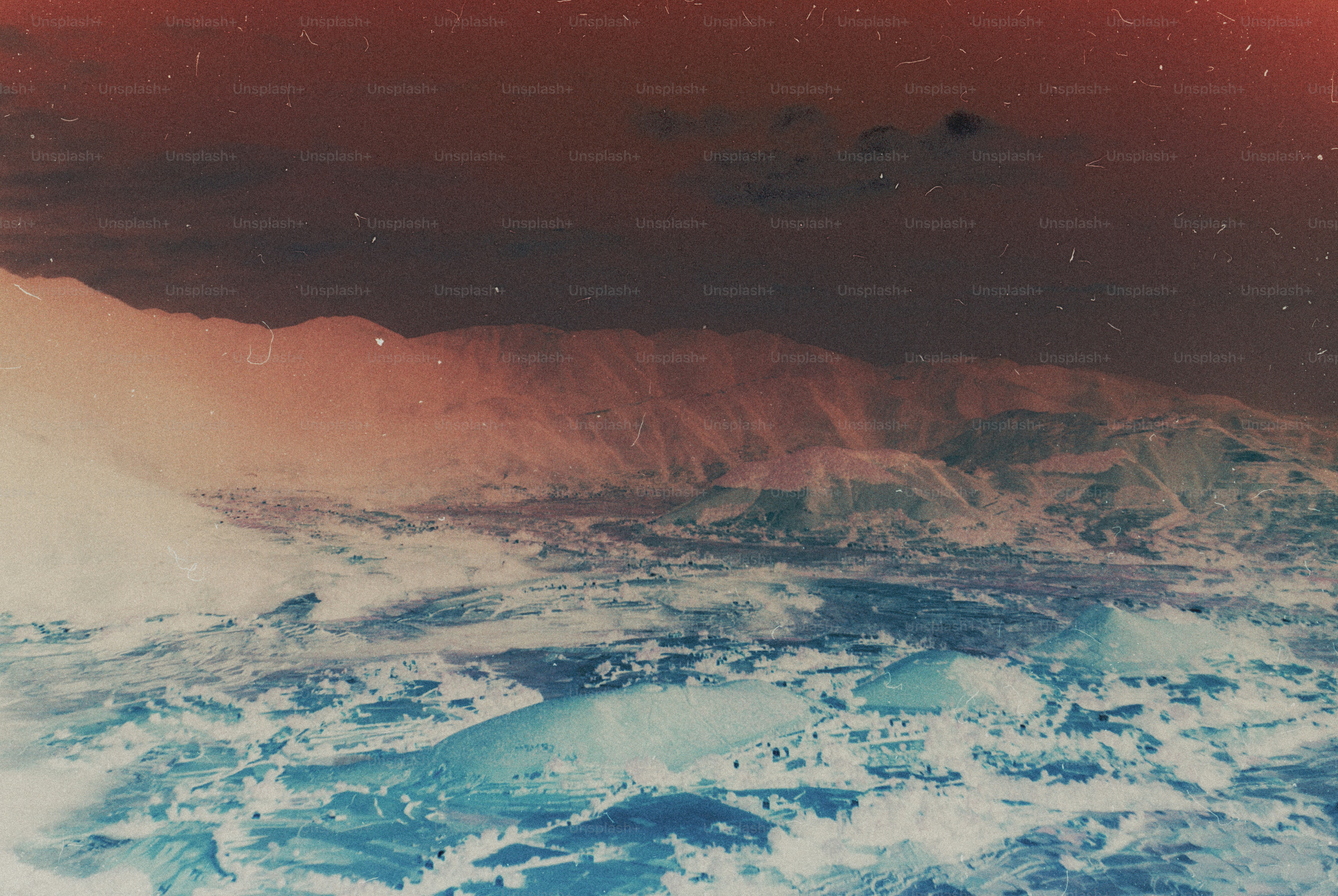 Inverted mountain landscape with dark sky - Photo on Unsplash+