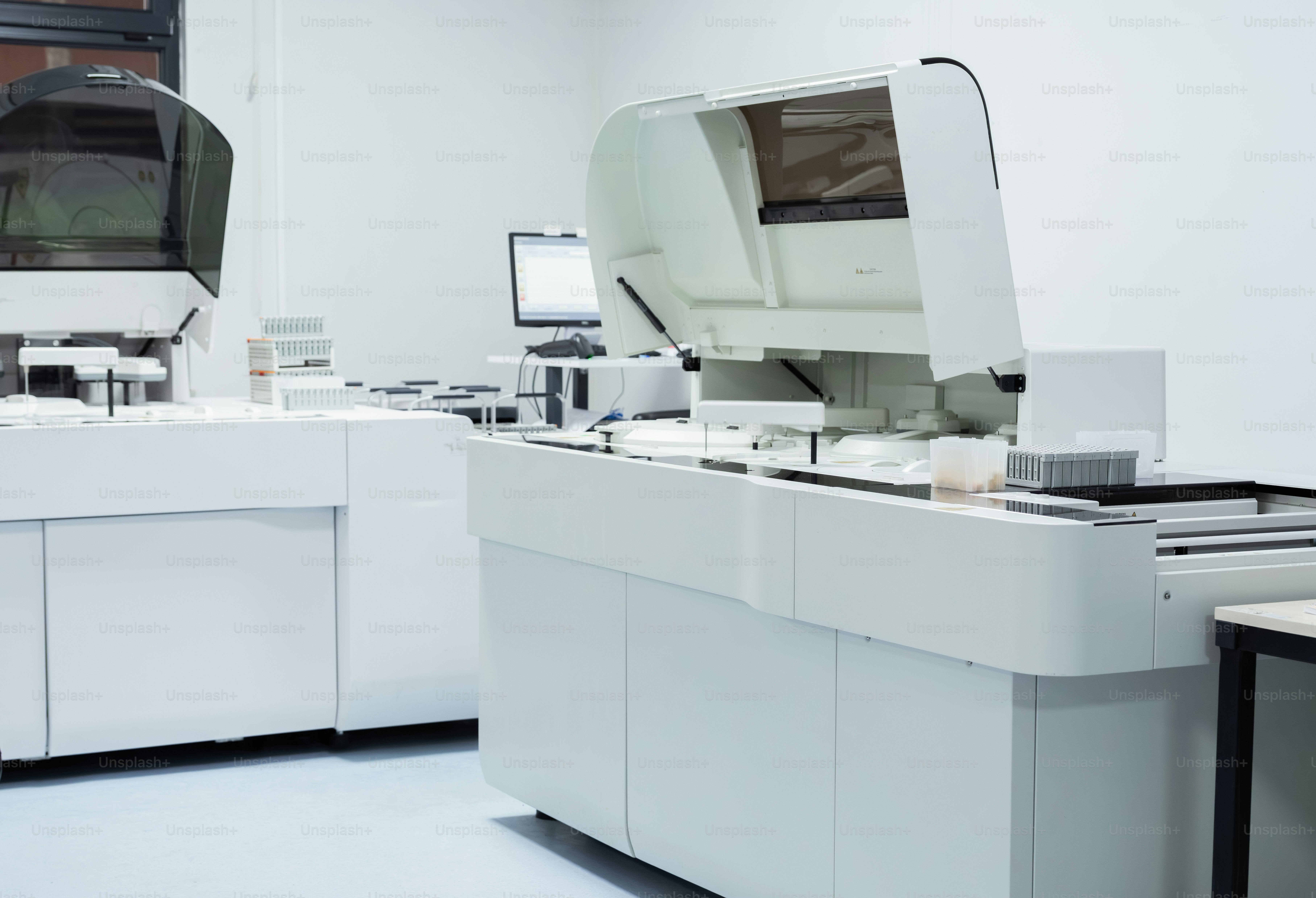 Clinical chemistry analyzer in laboratory - Photo on Unsplash+