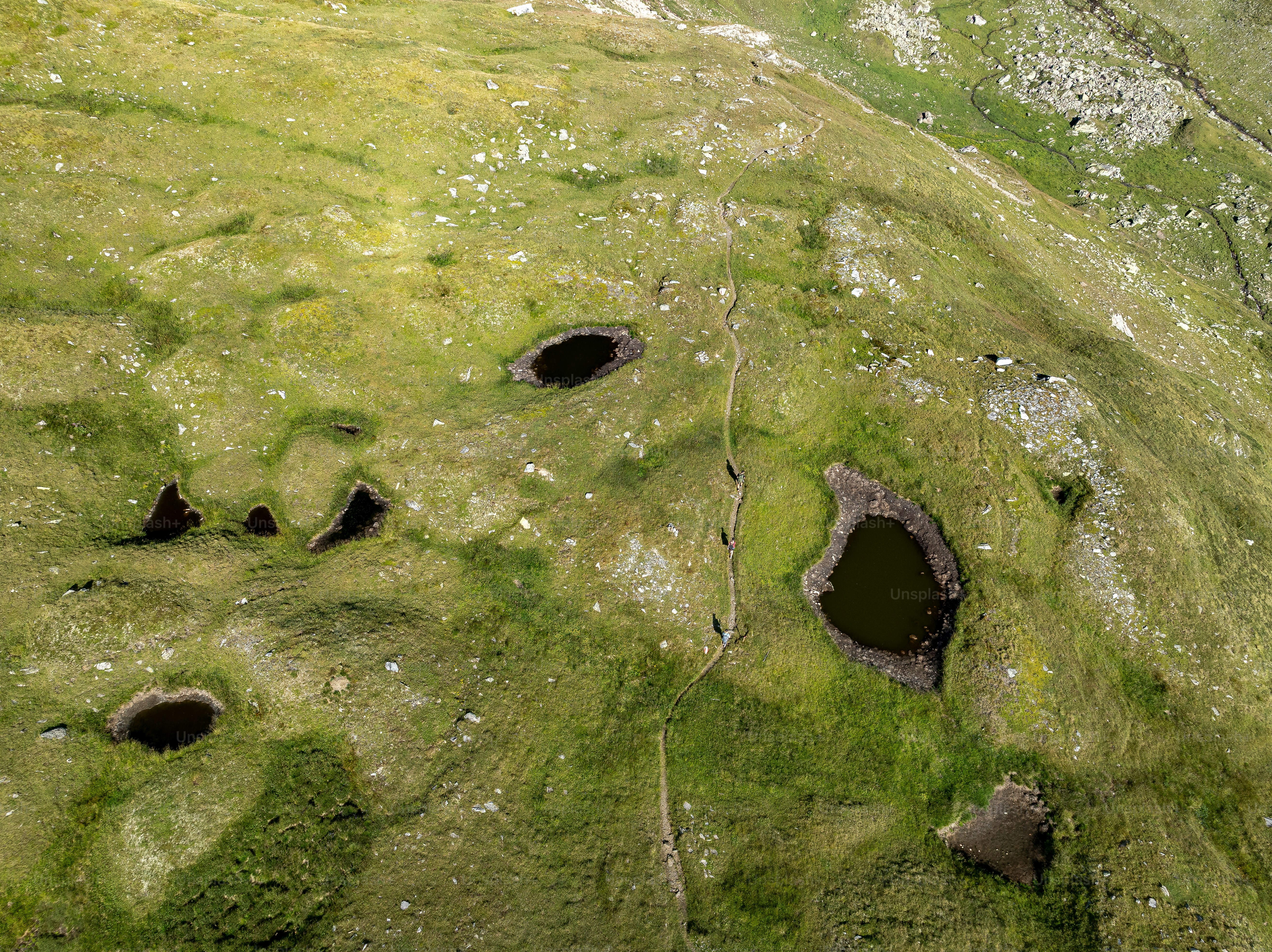 Hikers on Grossglockner mountain slope - Photo on Unsplash+