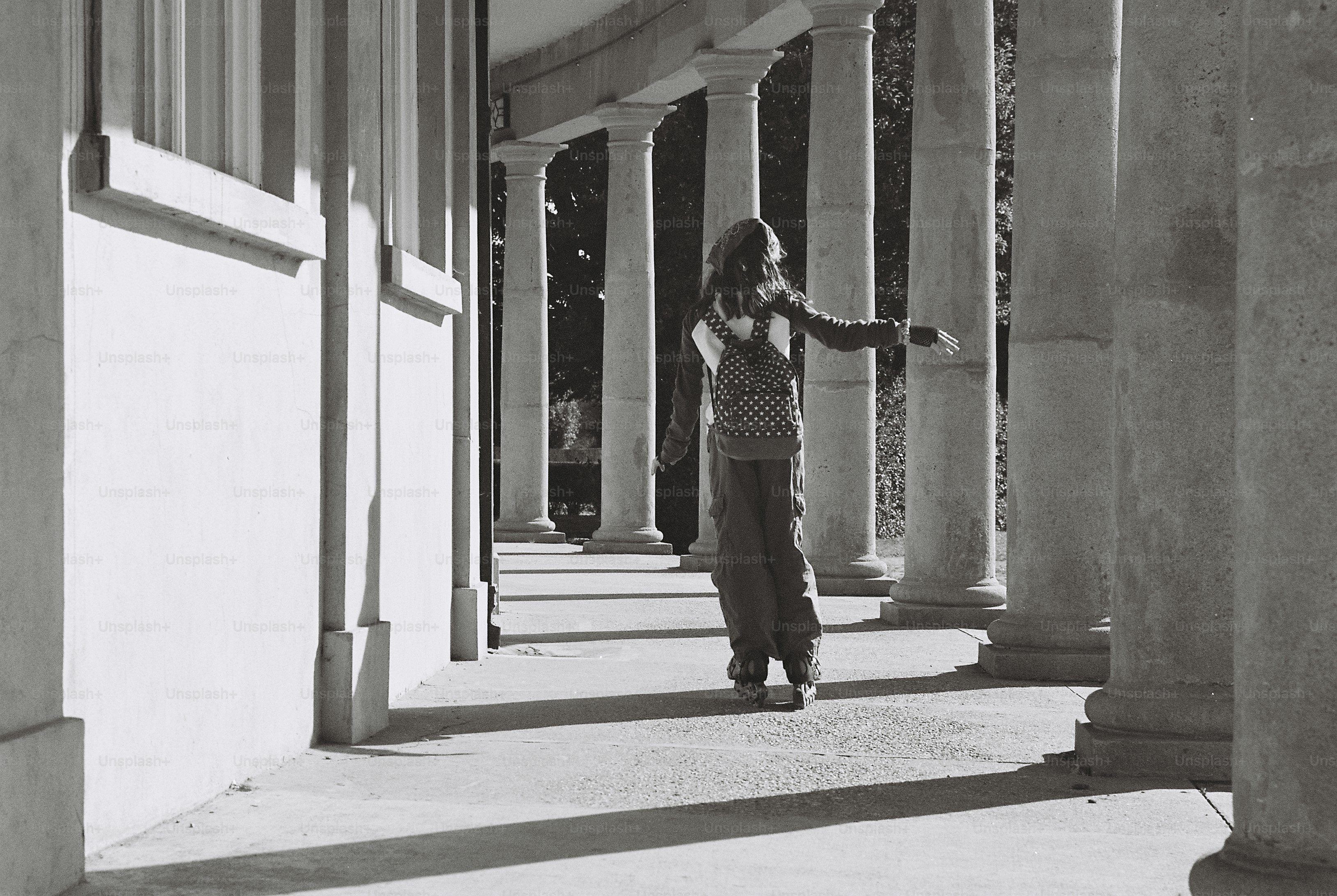 Child on inline skates in walkway - Photo on Unsplash+