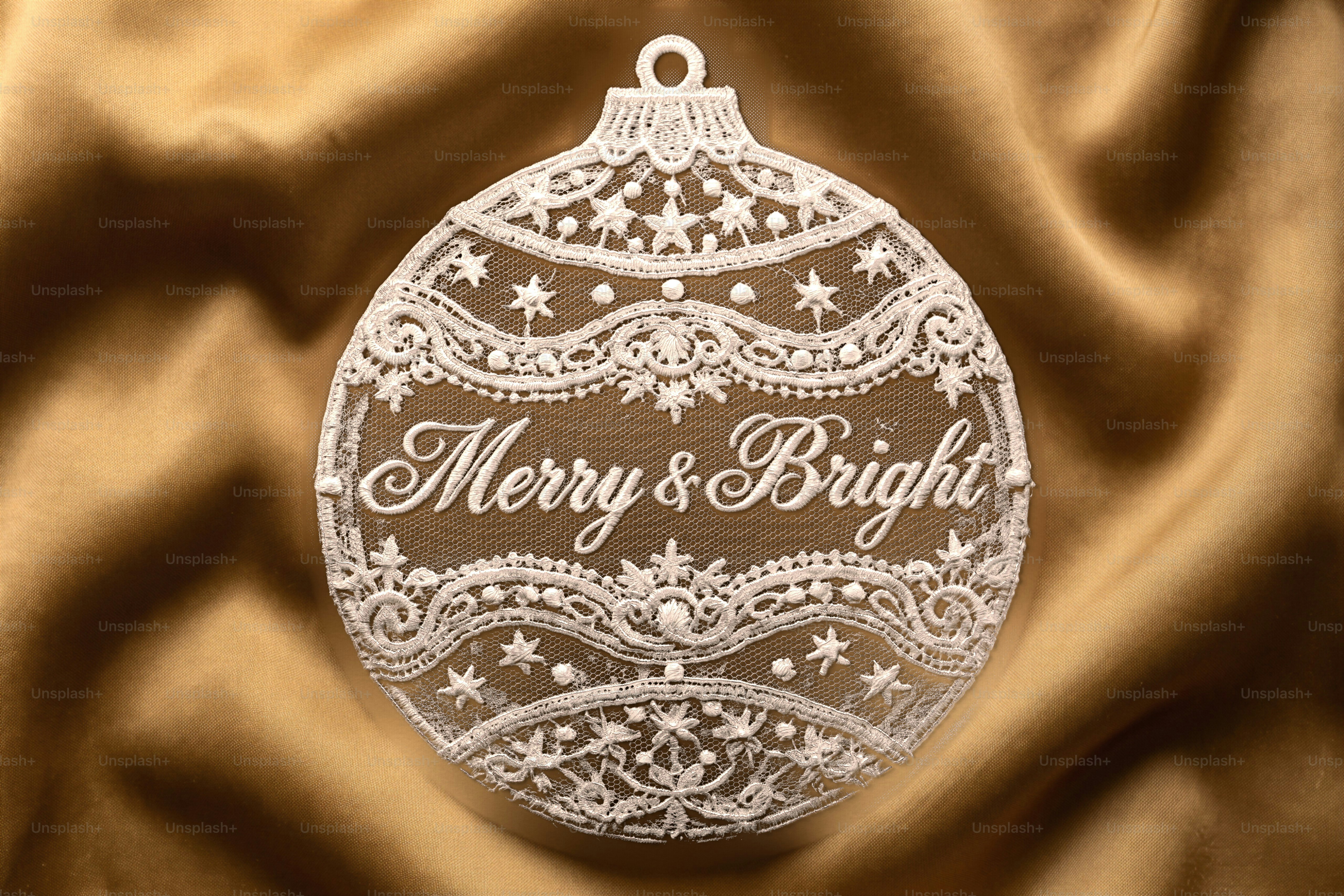 Heart-shaped lace doily with holiday text - Photo on Unsplash+