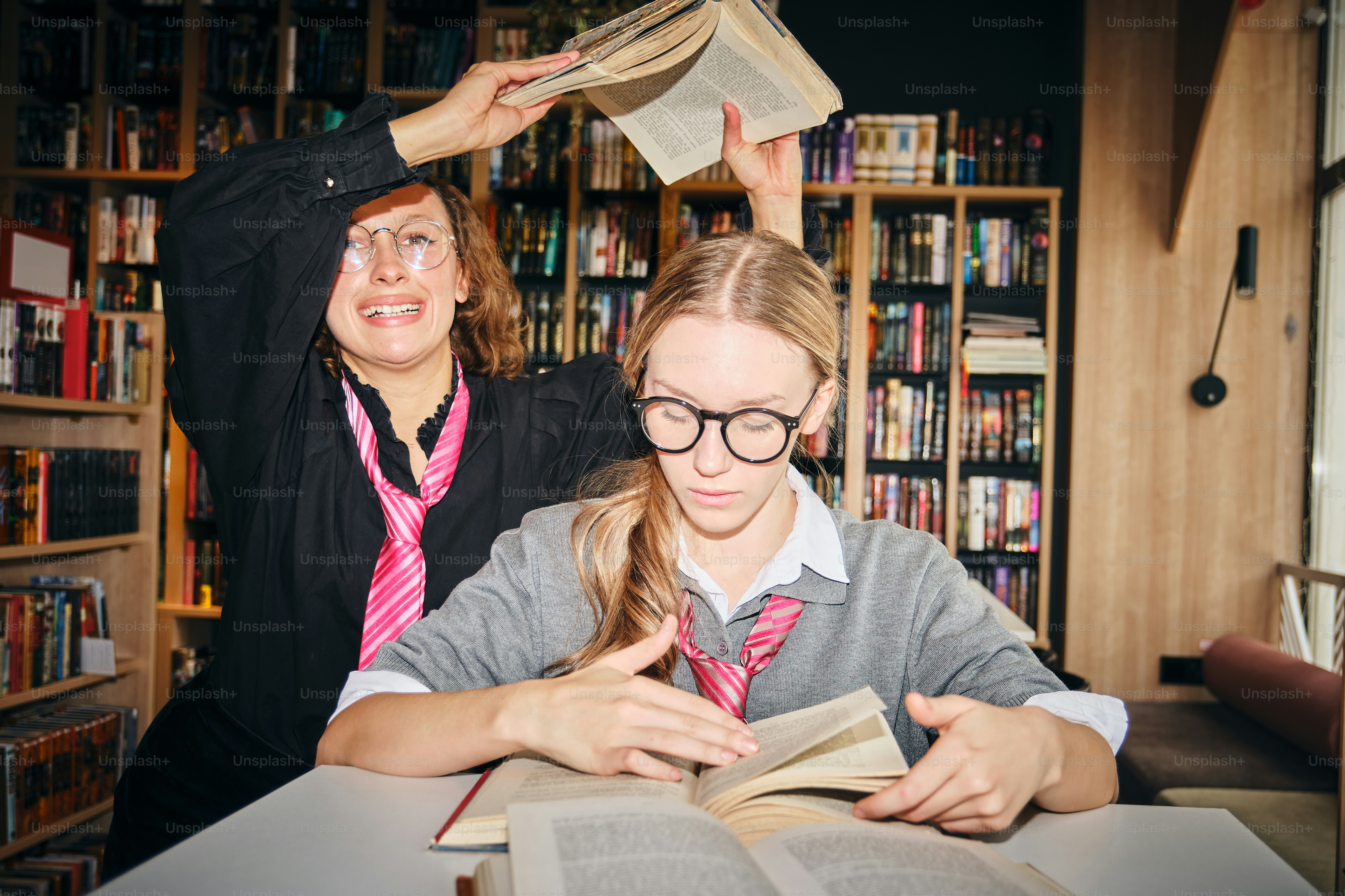 Two people in school uniforms - Photo on Unsplash+