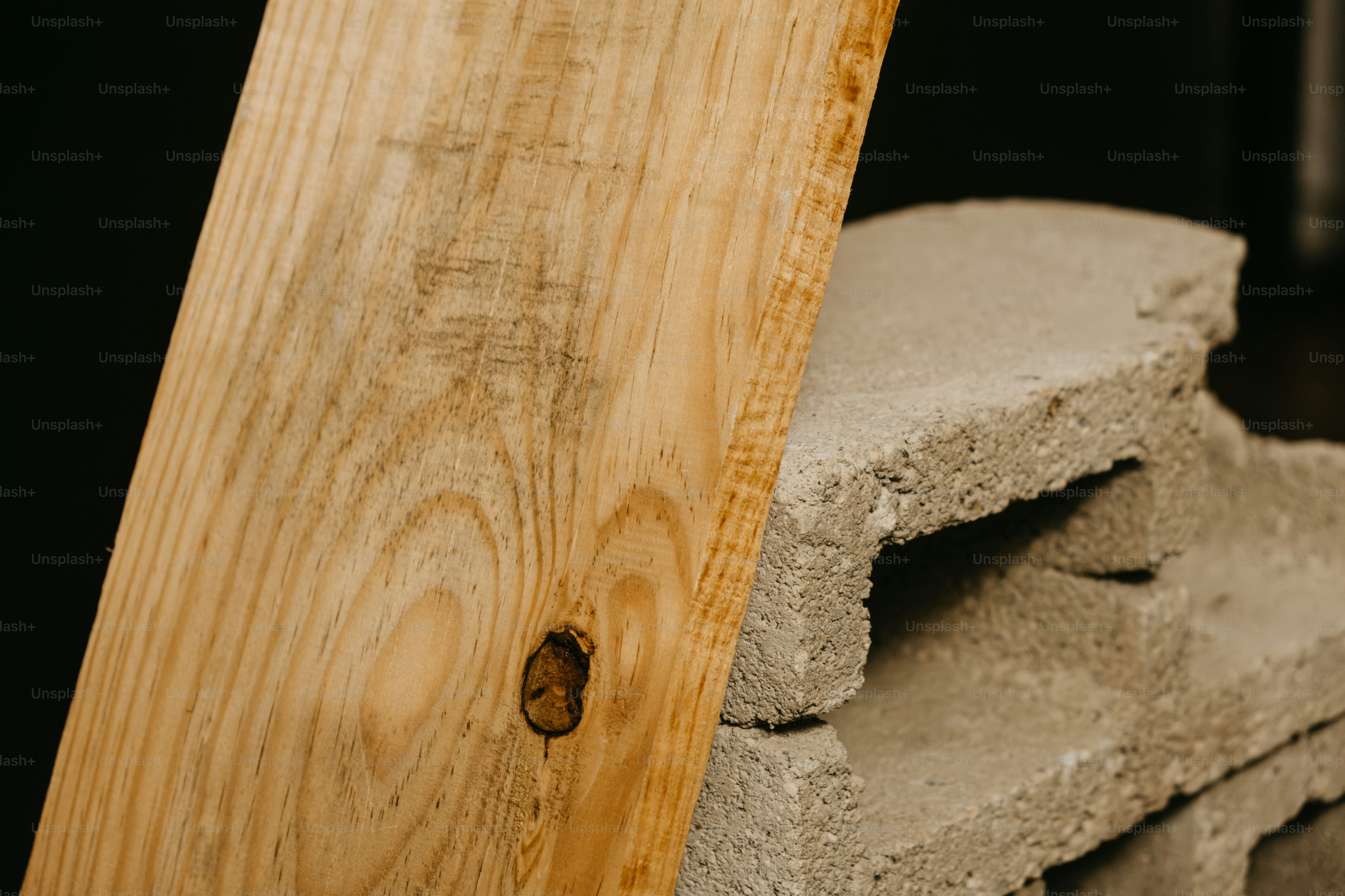 Rough concrete block with hollow openings - Photo on Unsplash+