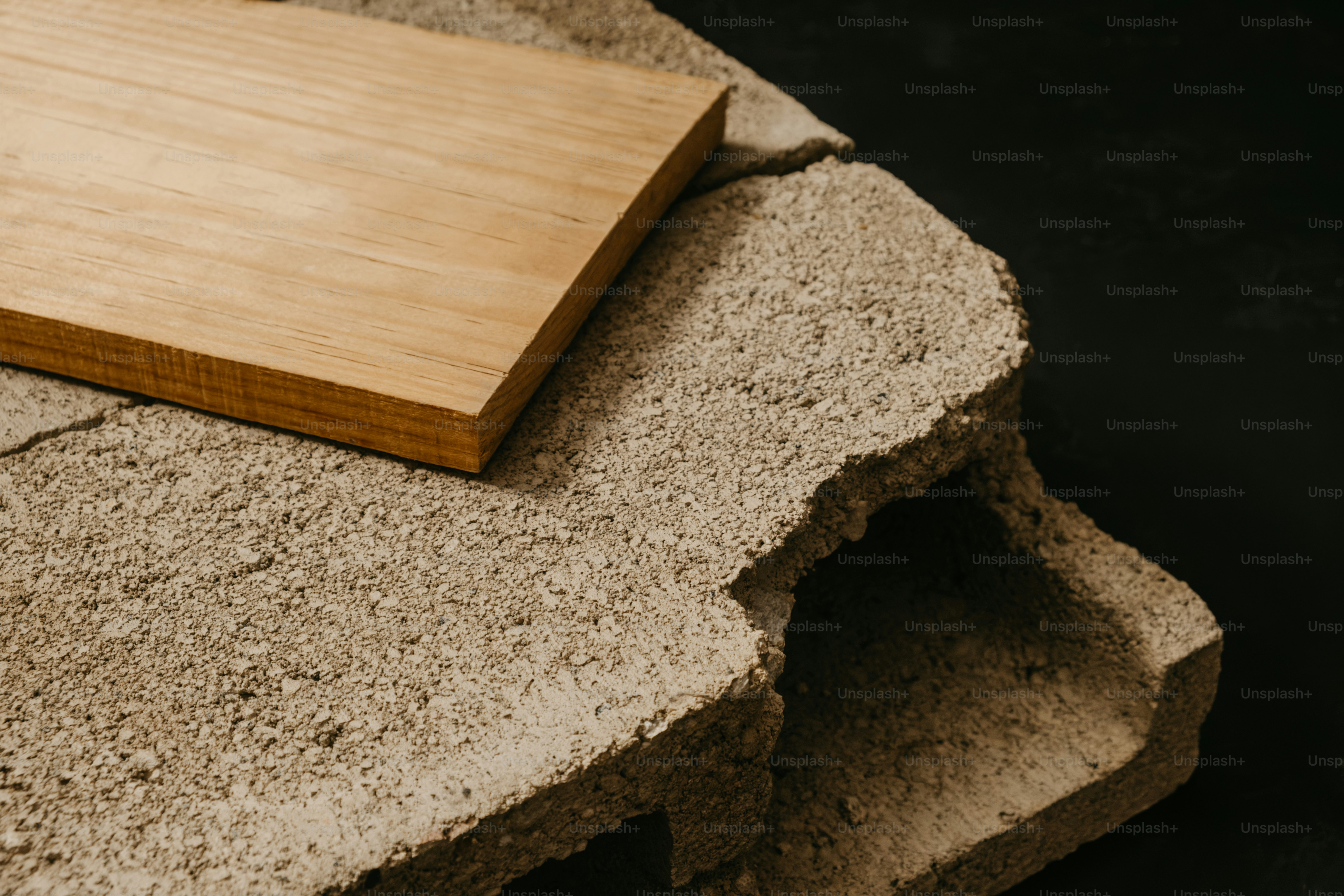 Rough concrete block with hollow openings - Photo on Unsplash+