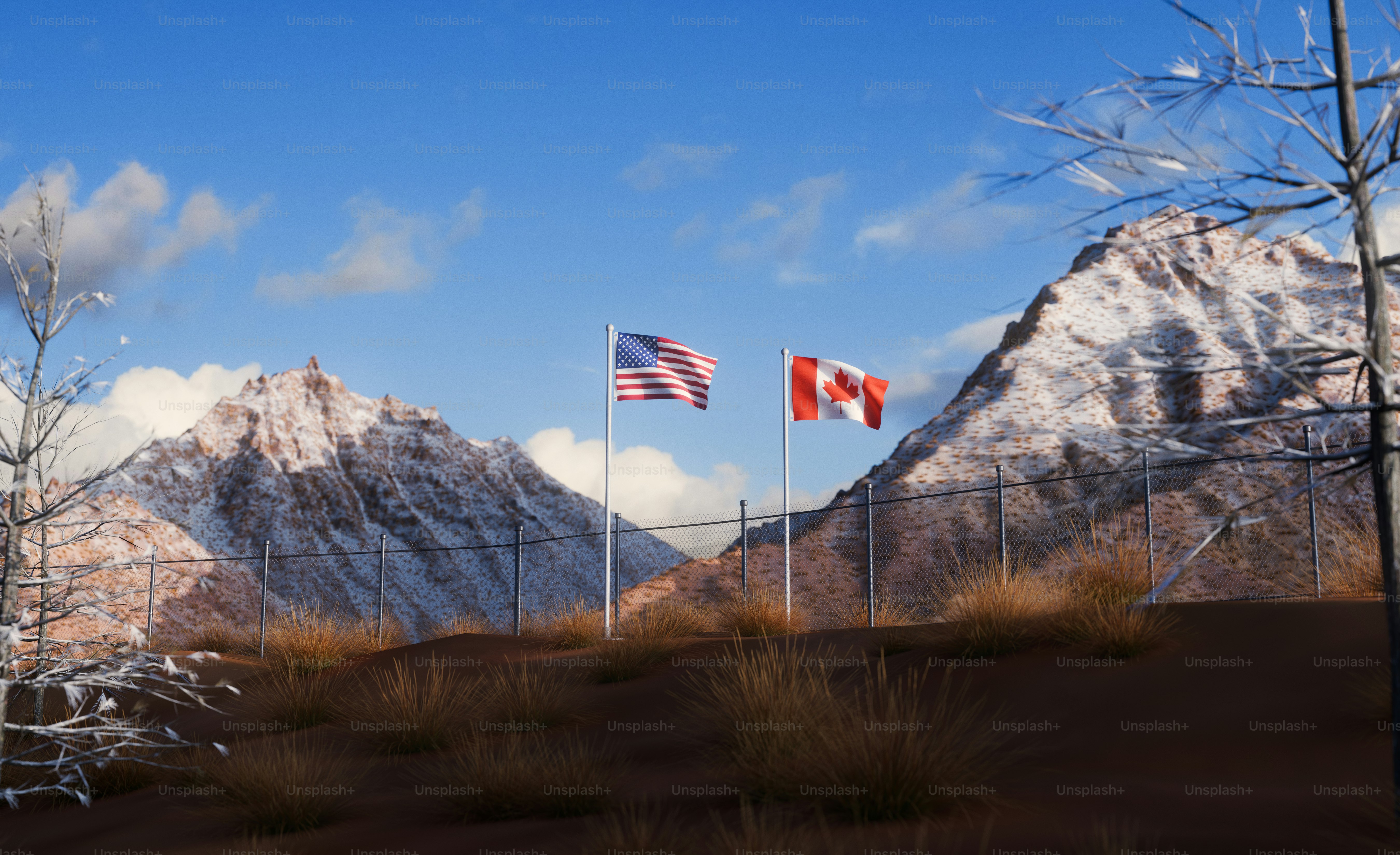 American and Canadian flags before mountains - Photo on Unsplash+