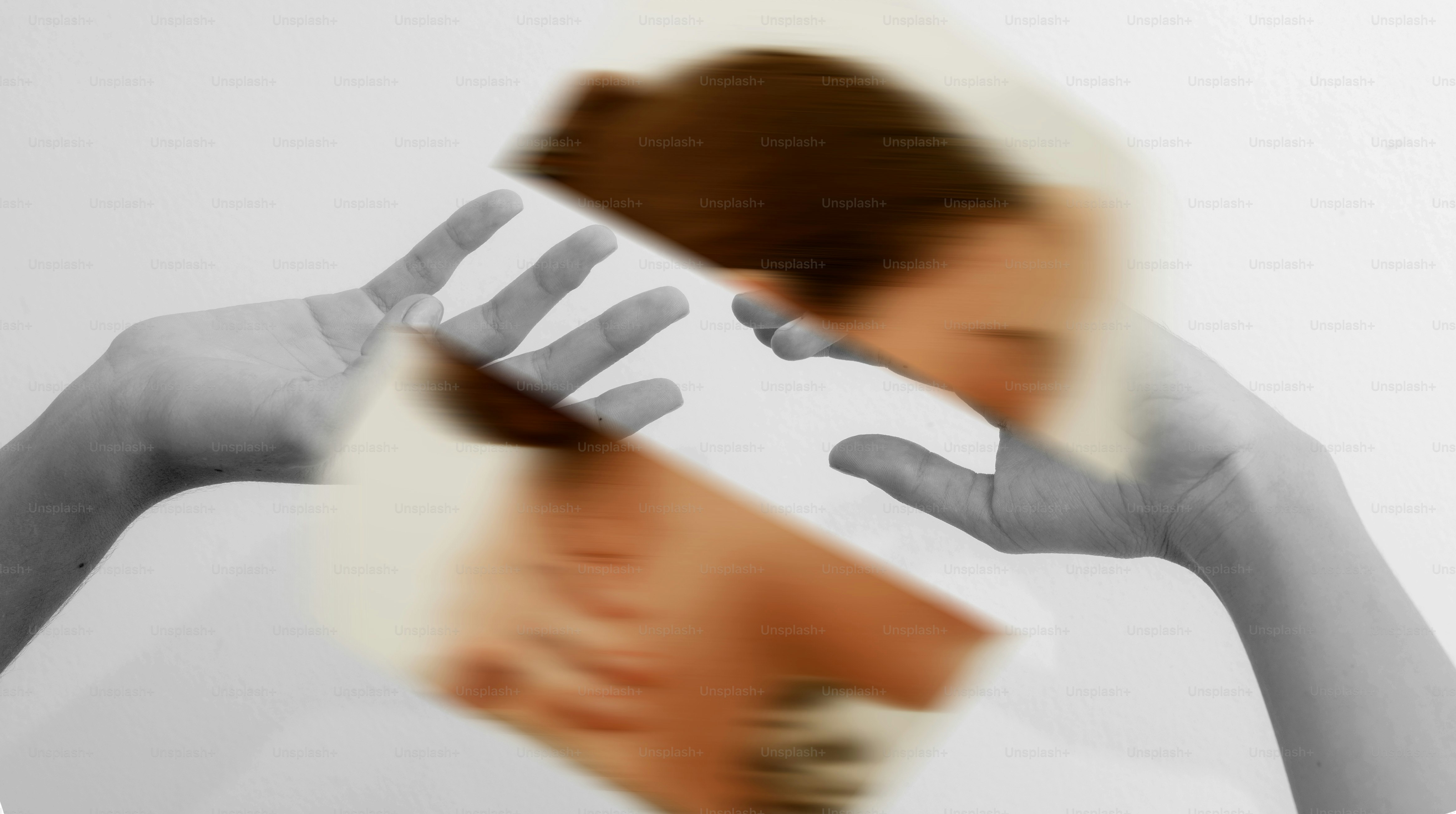 Hands reaching toward blurred objects - Photo on Unsplash+