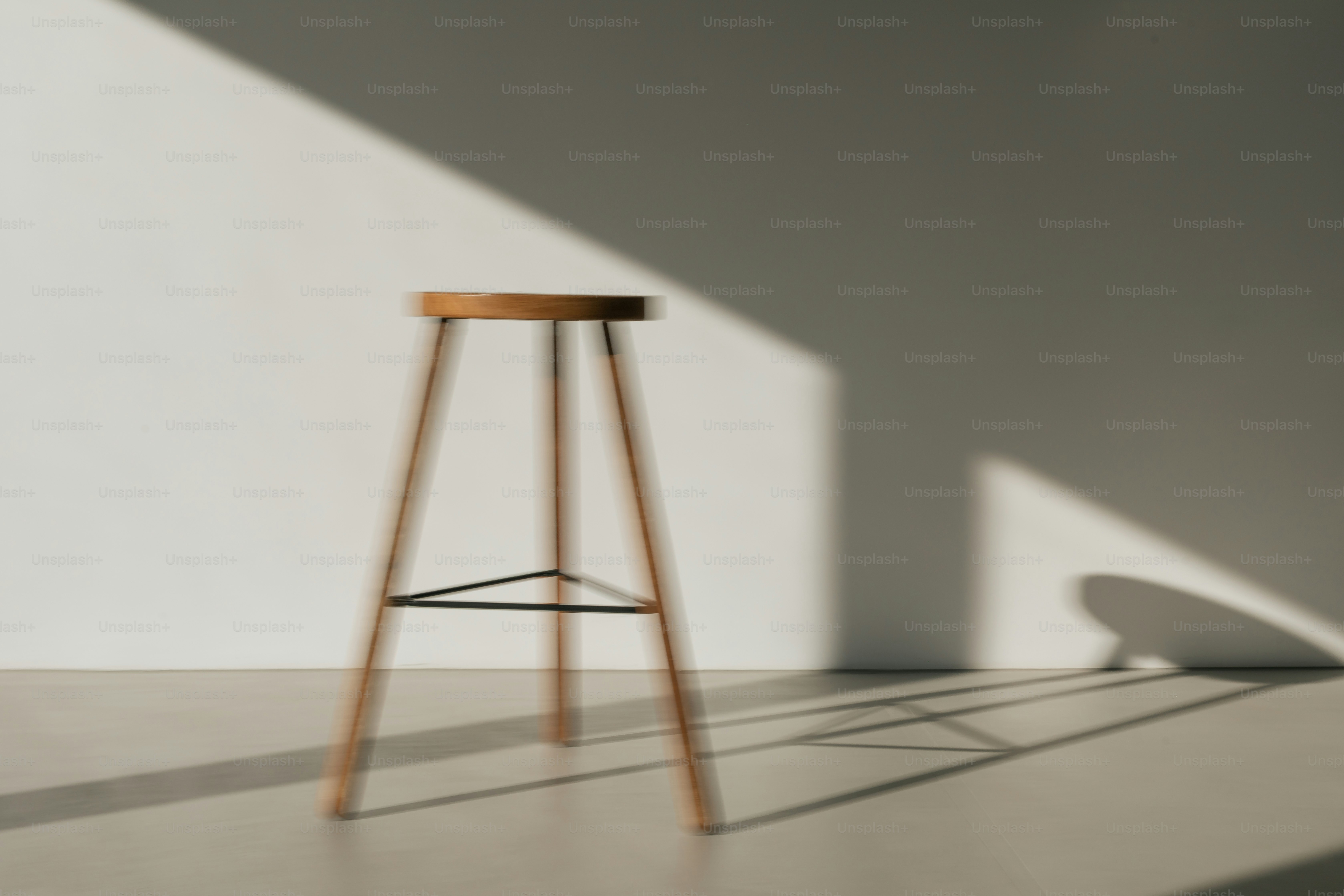 Wooden stool with motion blur - Photo on Unsplash+