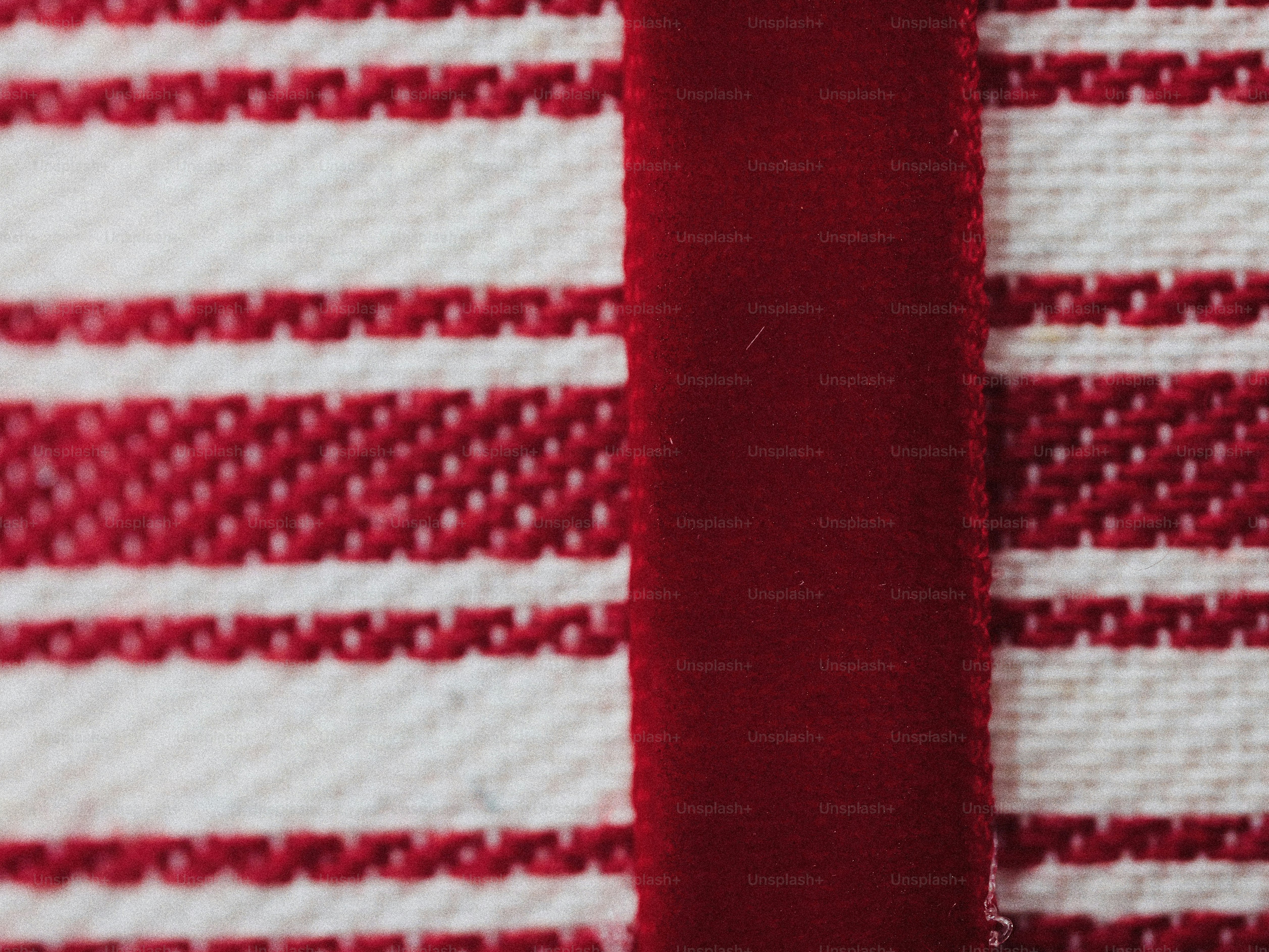 Red and white striped candy canes - Photo on Unsplash+
