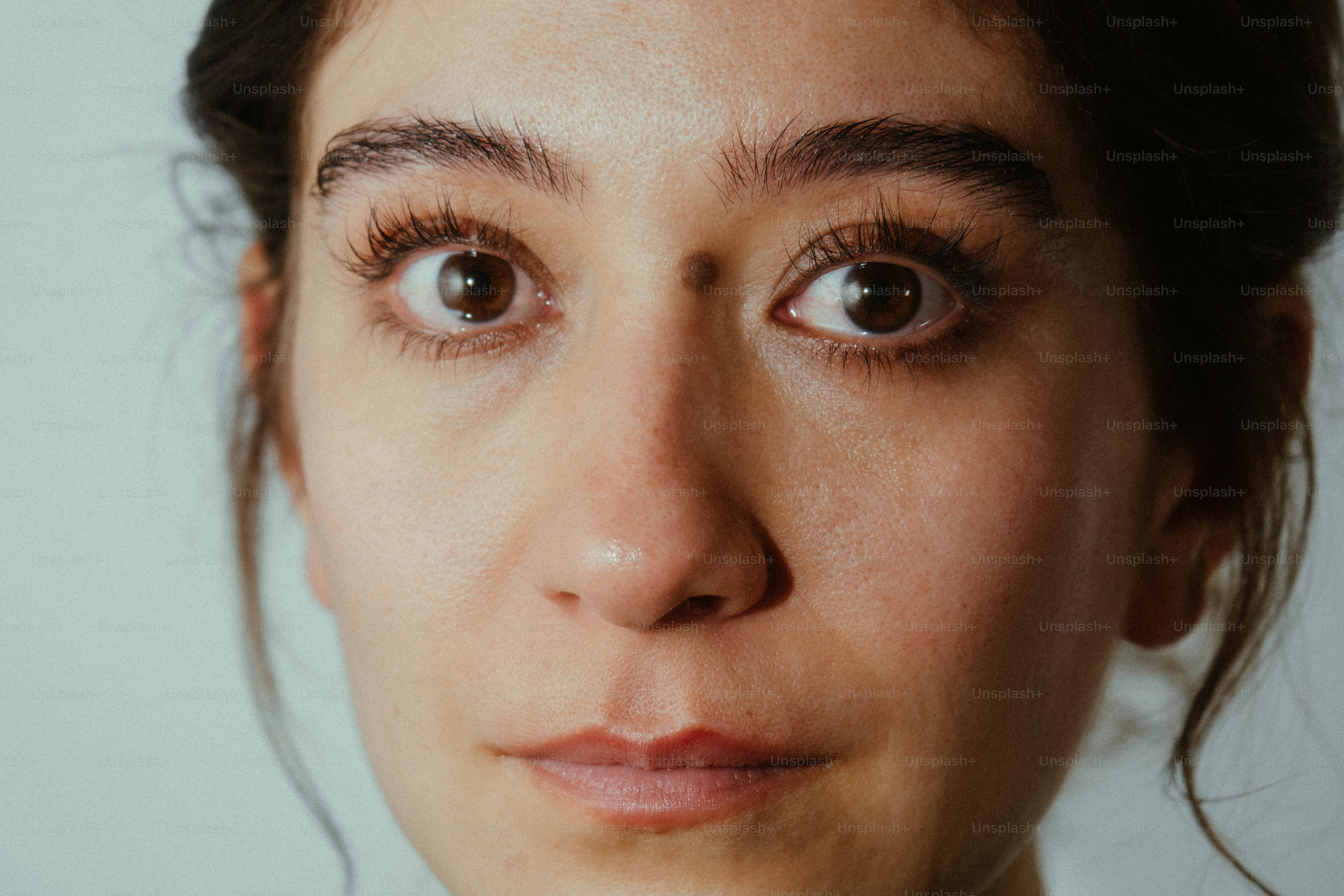 Woman smiling with closed eyes - Photo on Unsplash+