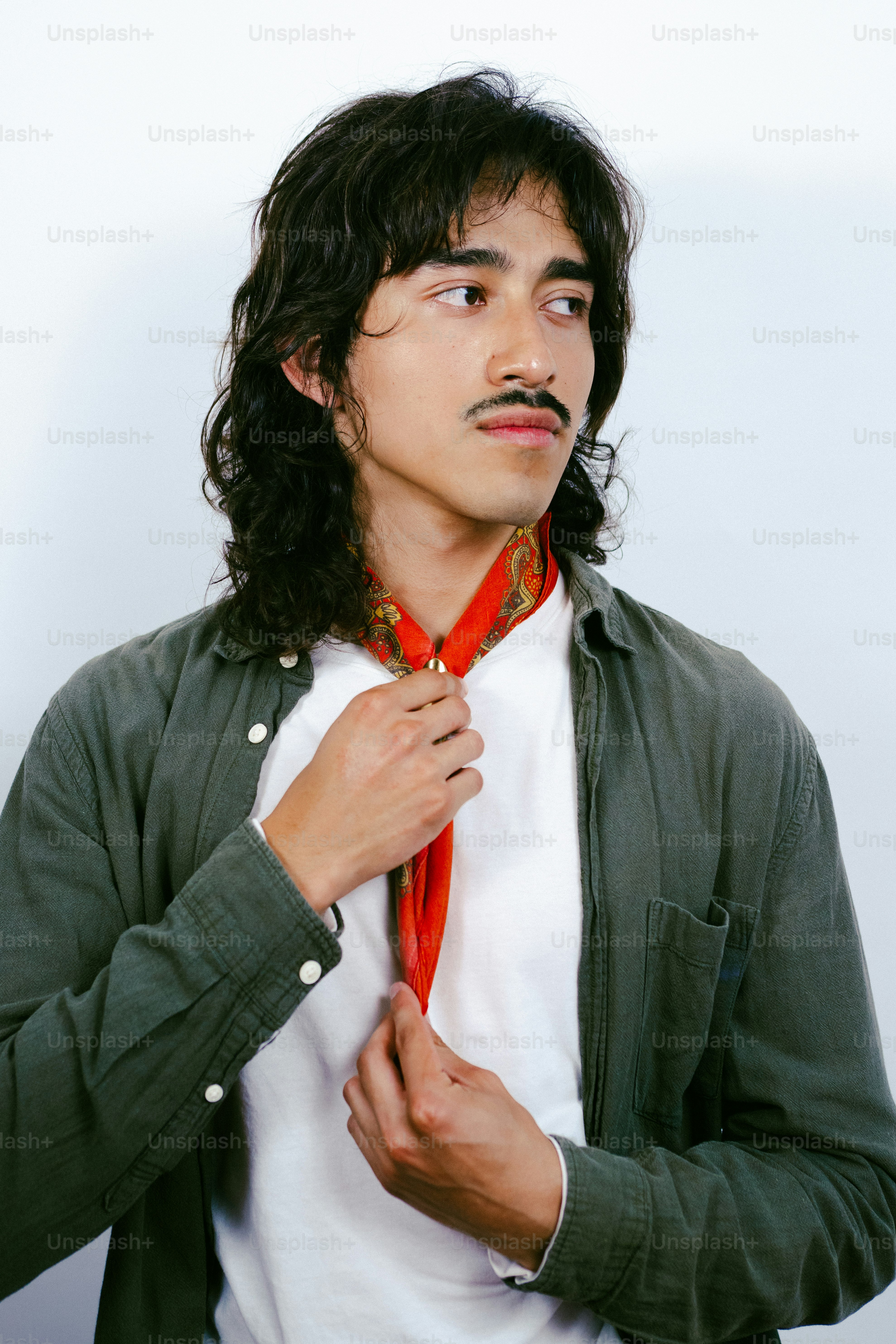Man with mustache wearing striped shirt - Photo on Unsplash+